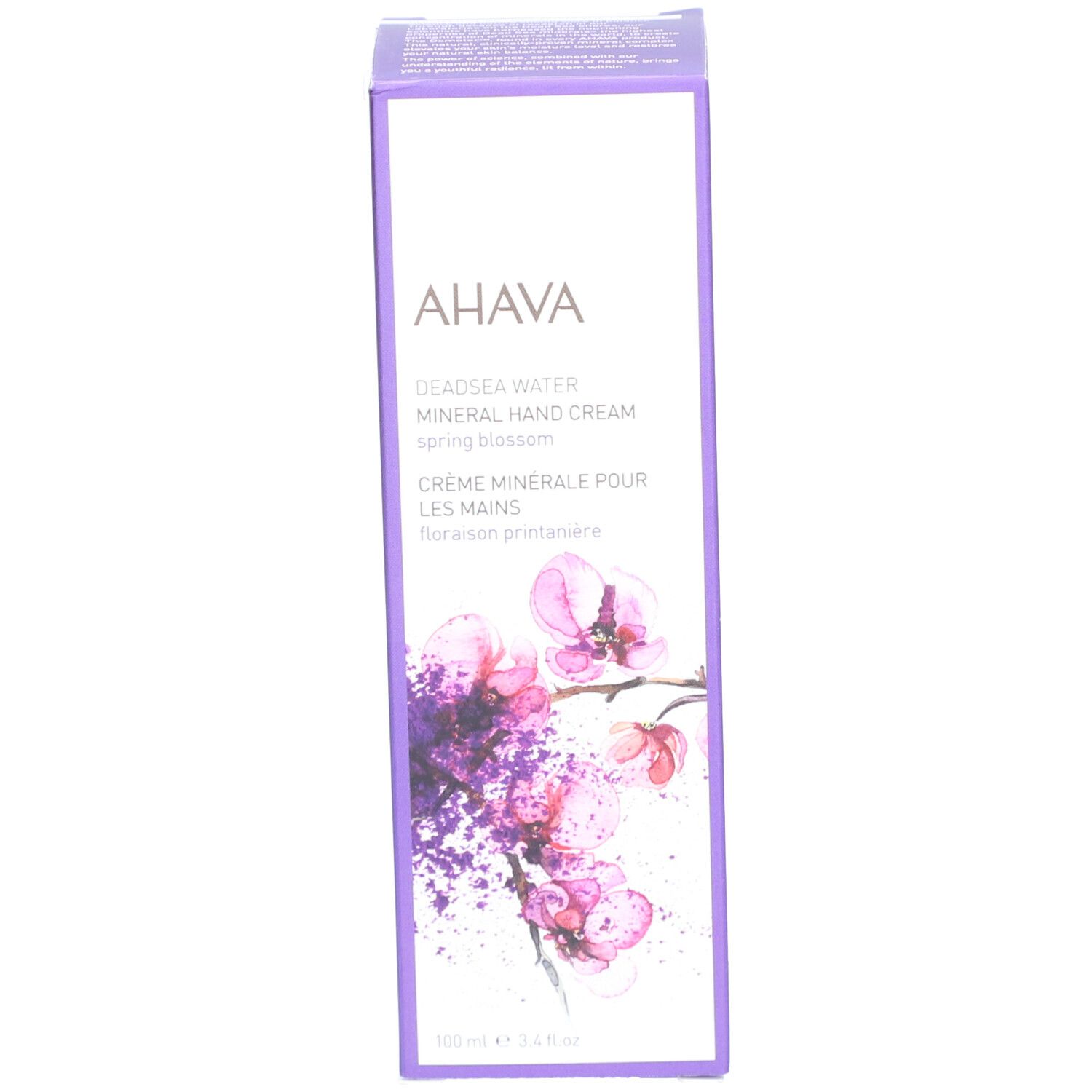 Aufrechte Produktverpackung. AHAVA Mineral Hand Cream Spring Blossom. Lila und weiß. Blumenabbildung.