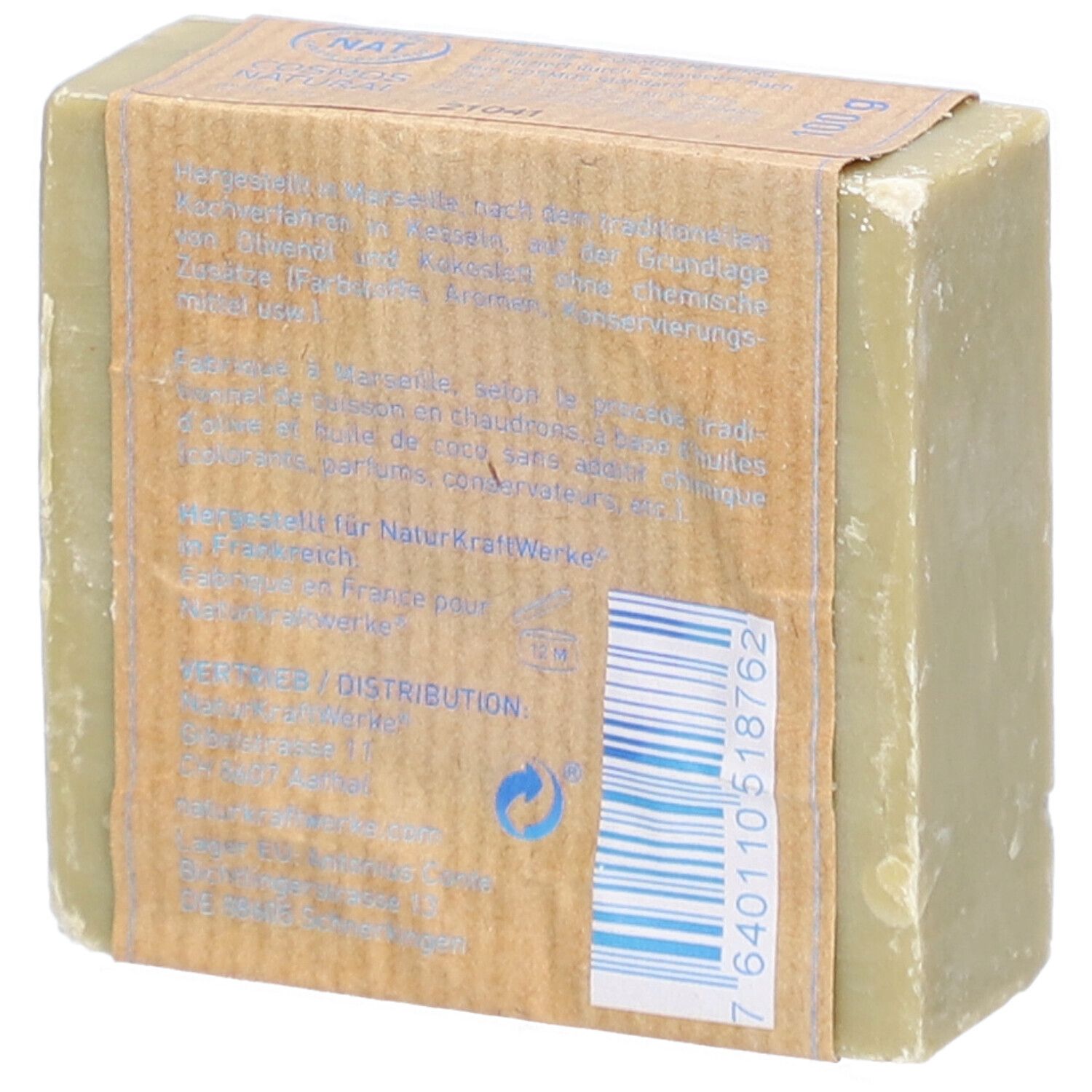 Seife mit Papierbanderole. Aufschrift: Savon de Marseille, Marseille Seife, Olive. Rückseite mit Text und Barcode. Marke Naturkraftwerke.