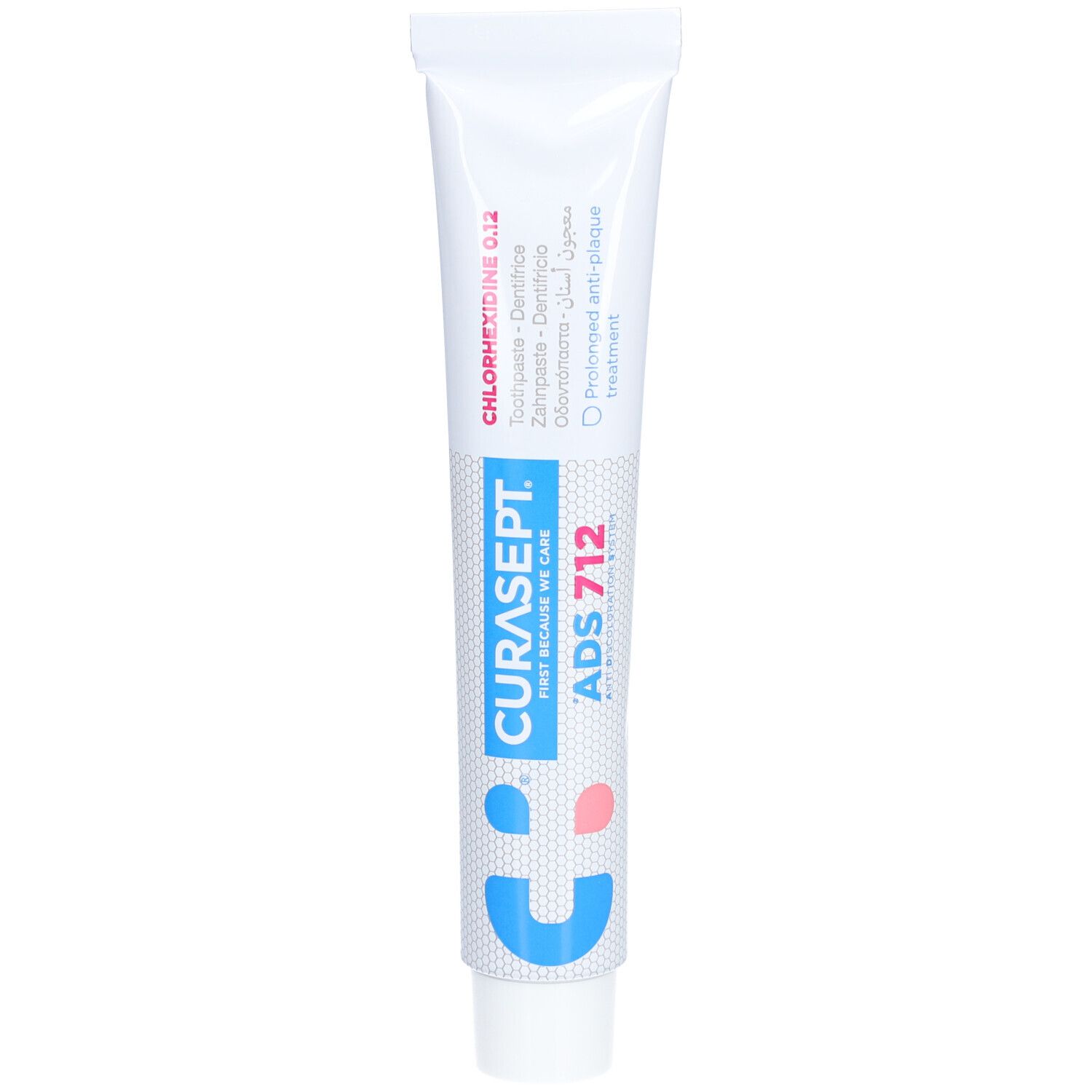 Tube blanche avec texte bleu et rose. Contient du dentifrice. Texte: CURASEPT ADS 712, Chlorhexidine 0,12%.