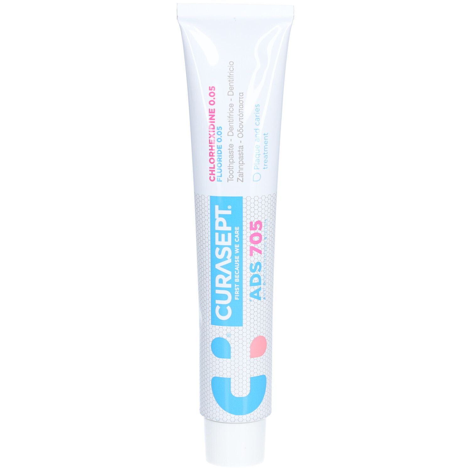 Zahncreme-Tube, weiß mit blauer und rosa Schrift. CURASEPT ADS 705, Chlorhexidin 0,05 % und Fluorid 0,05 %.
