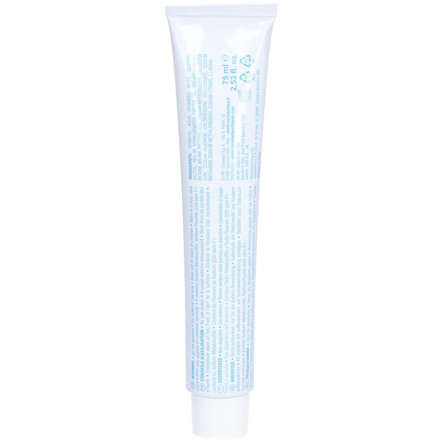 Rückseite einer weißen Zahncreme-Tube. Enthält Informationen und Inhaltsstoffe in verschiedenen Sprachen.