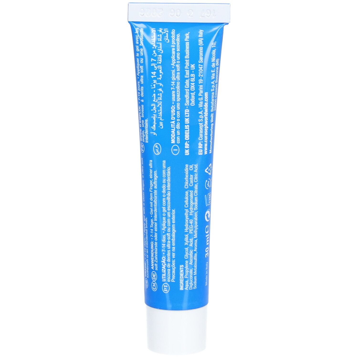 Rückseite der blauen Tube. Text in mehreren Sprachen, darunter Deutsch, Italienisch, Niederländisch und Französisch. Inhaltsstoffe.