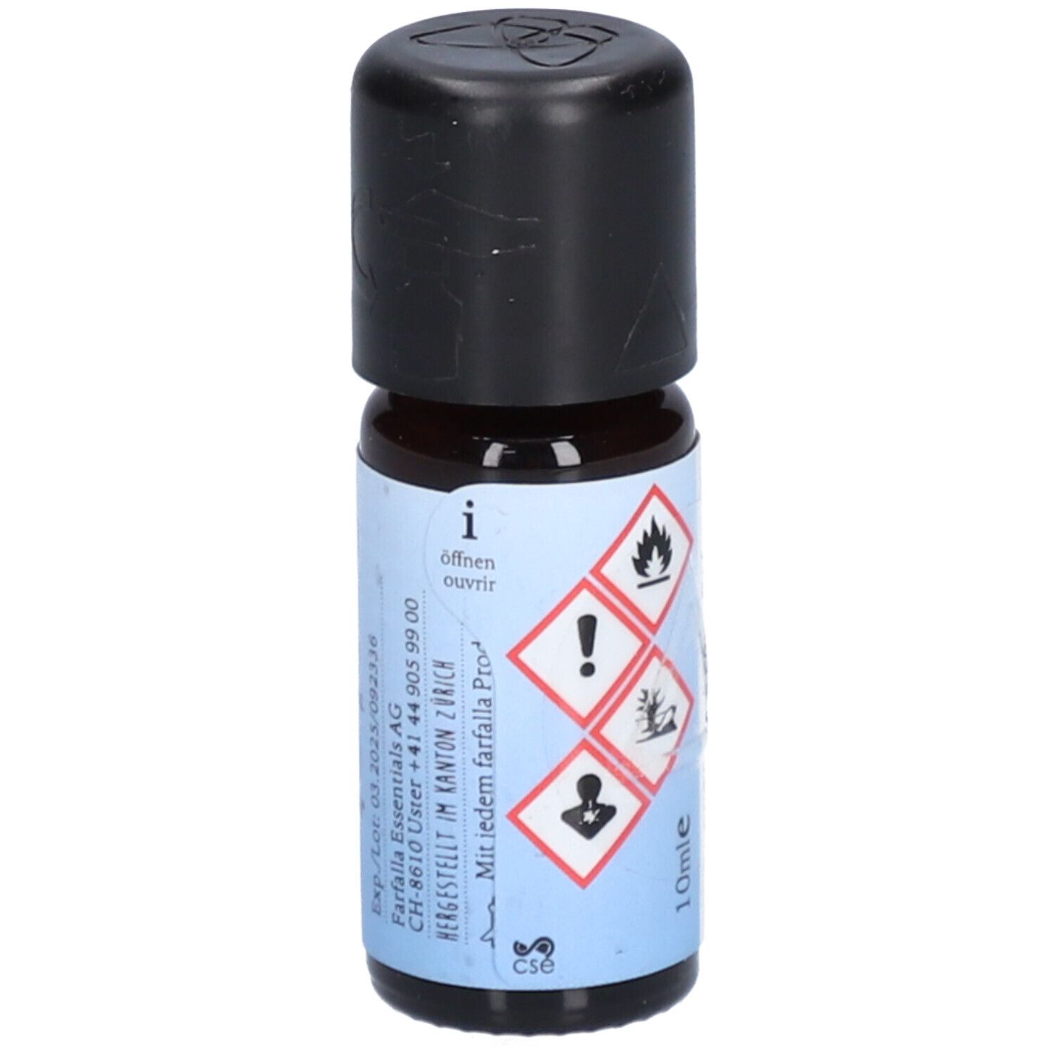 Braune Glasflasche mit schwarzem Deckel. Etikett mit Gefahrensymbolen, Text "öffnen" und Herstellerinformationen.