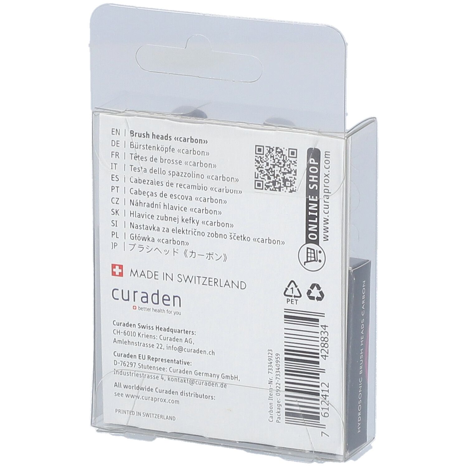 Rückseite der Verpackung mit Text. Enthält Informationen über den Hersteller, QR-Code und das Logo "Made in Switzerland".