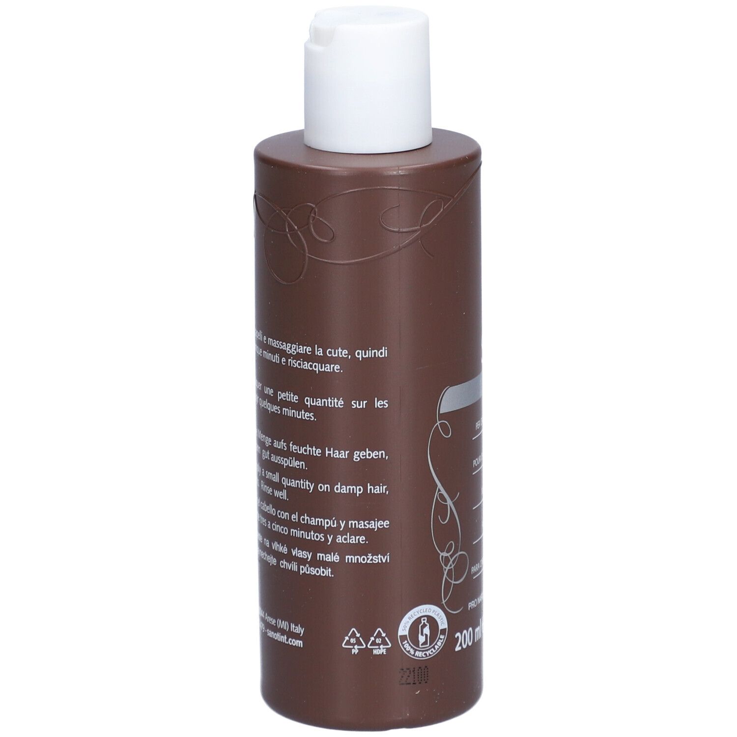 Rückseite einer braunen Shampoo-Flasche mit weißem Deckel. Text in mehreren Sprachen. Recycling-Logo.