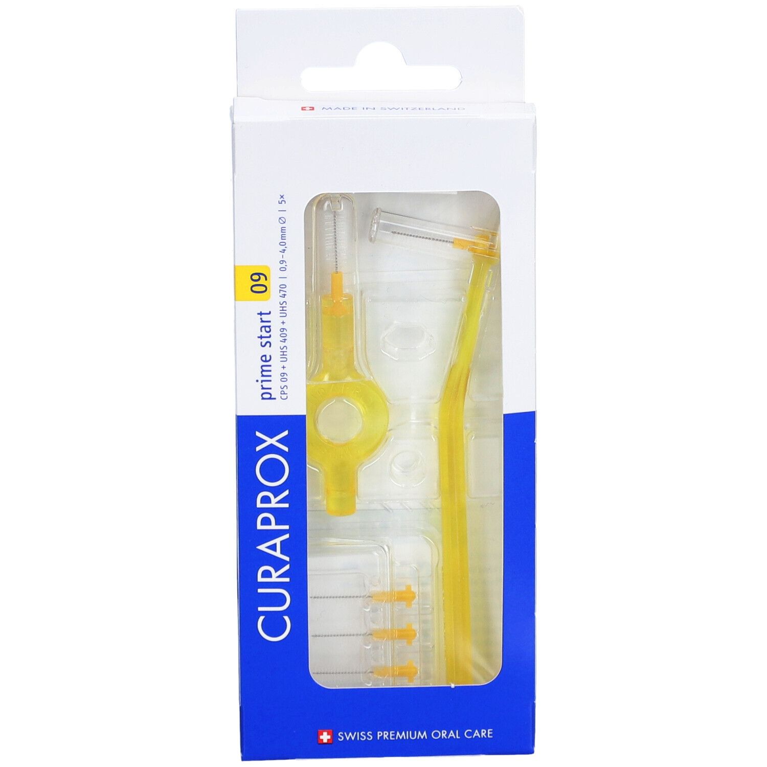Verpackung mit gelben Interdentalbürsten. Sichtbar: Halter, Bürstenköpfe, und Griff. Marke CURAPROX.