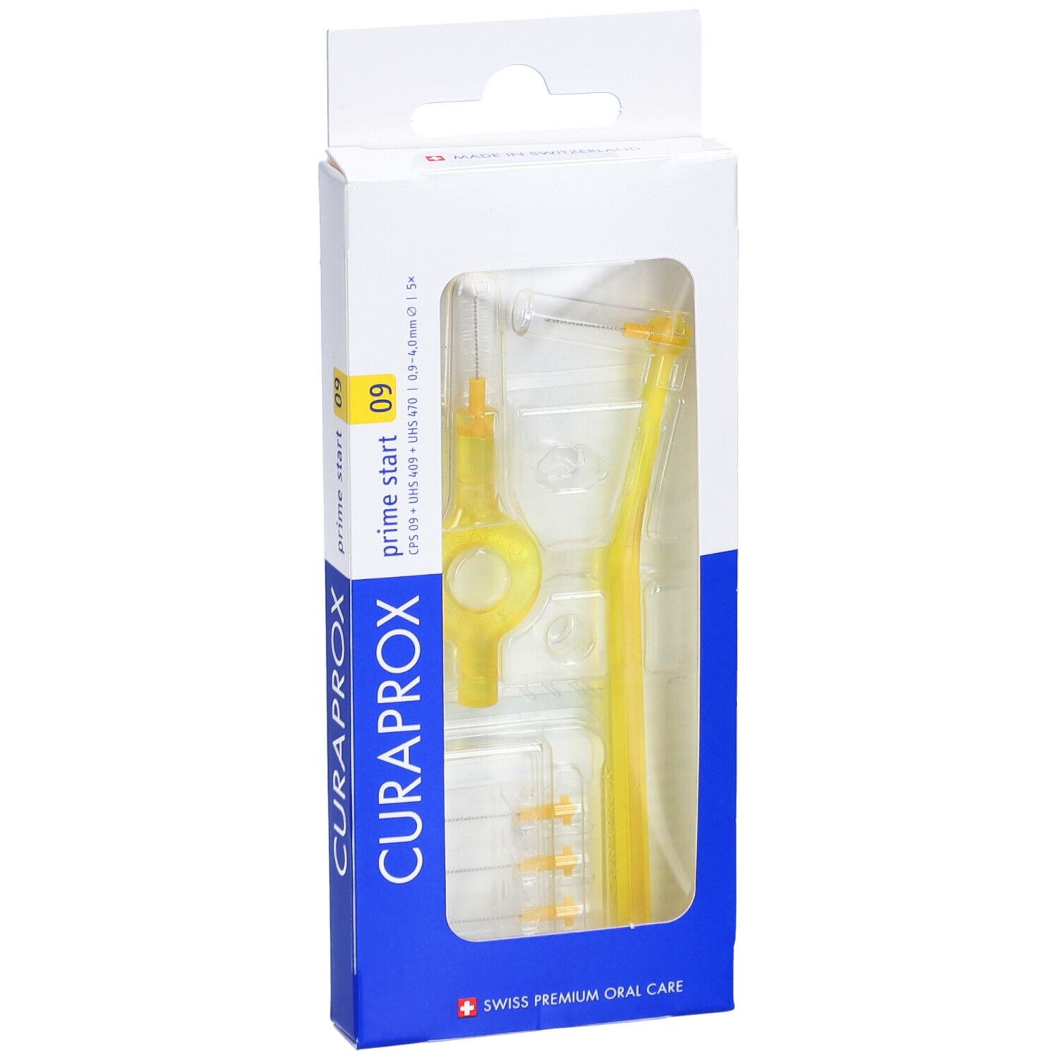 Verpackung mit gelben Interdentalbürsten. Sichtbar: Halter, Bürstenköpfe, und Griff. Marke CURAPROX.