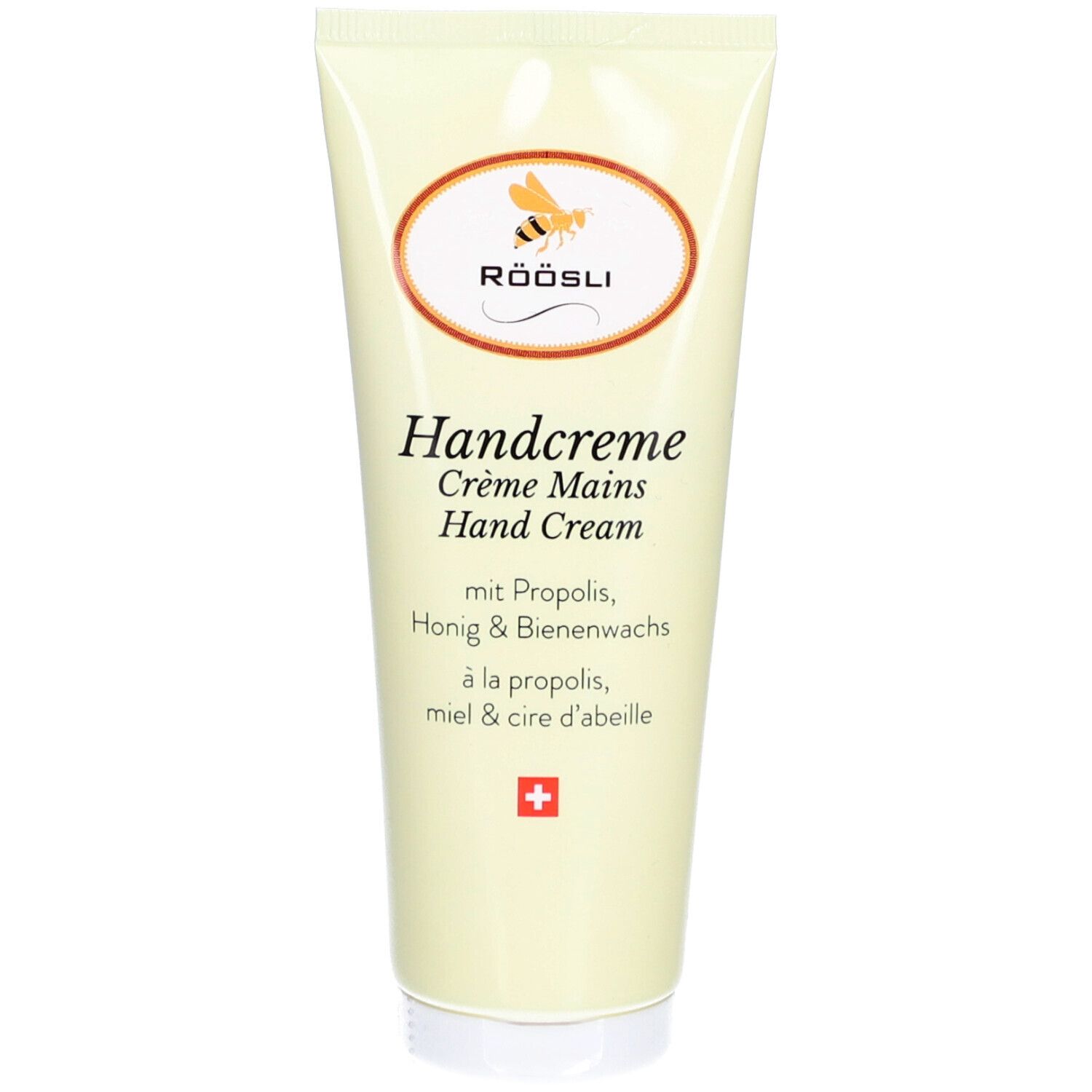 Creme-Tube mit Logo und Schriftzug. Enthält Propolis, Honig und Bienenwachs. Schweizer Kreuz.