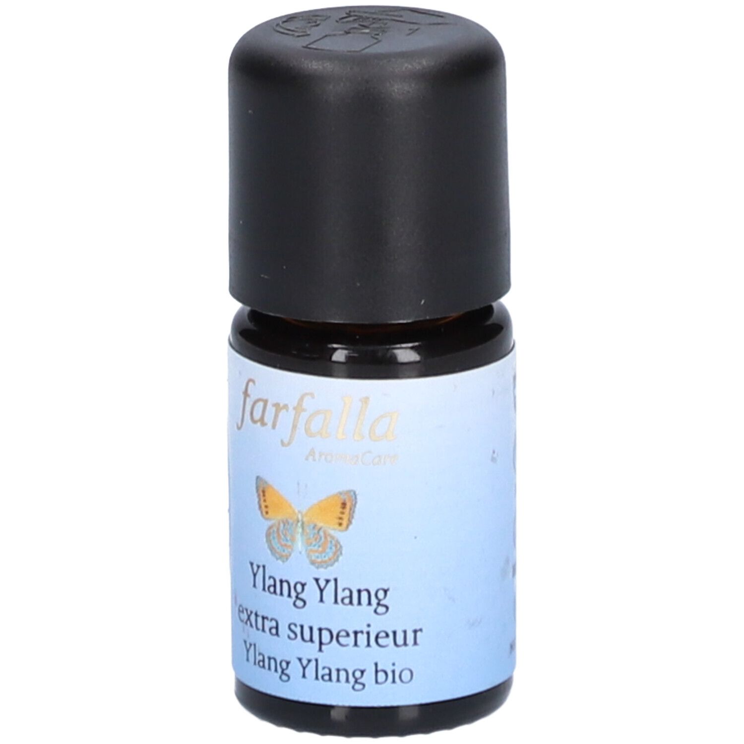 Petite bouteille en verre avec bouchon noir. L'étiquette indique "farfalla" et "Ylang Ylang extra superieur".