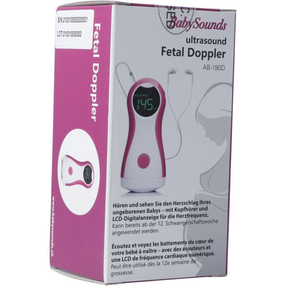 Rosa-weiße Verpackung mit BabySounds Fetal Doppler. Gerät mit Display, Kopfhöreranschluss. Text: Fetal Doppler, Ultraschall.