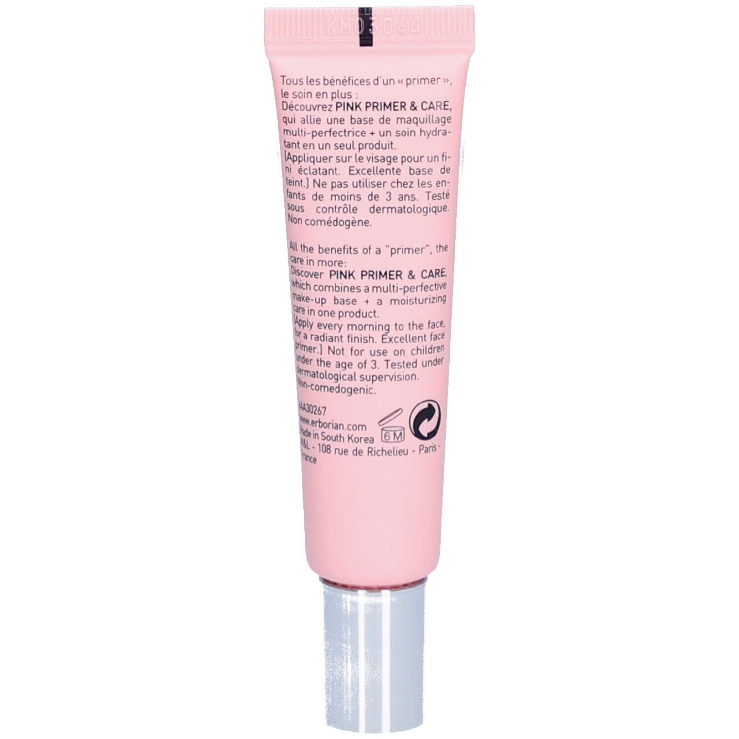 Rückseite einer rosa Tube mit Text in mehreren Sprachen. Silberne Kappe.