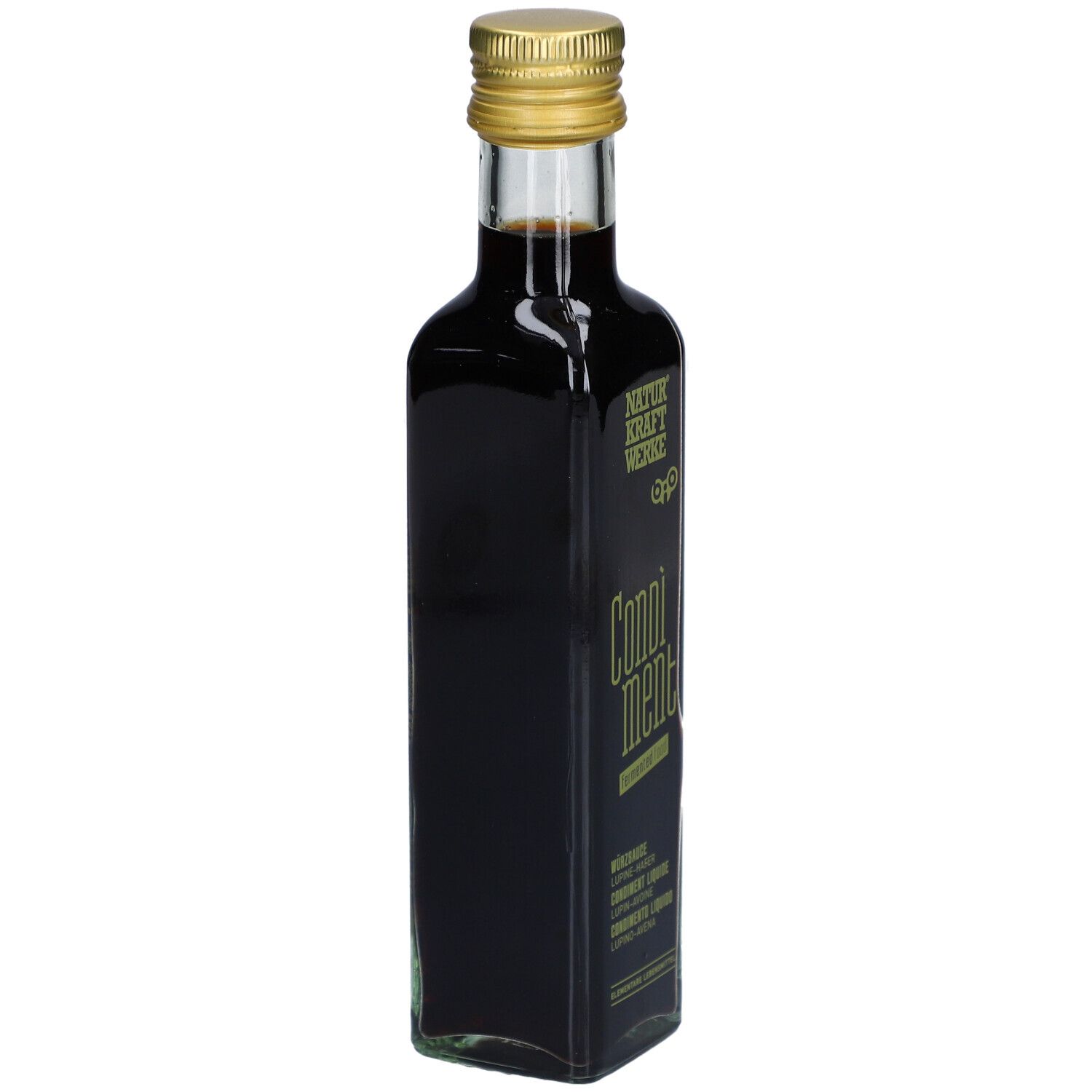 Bouteille en verre foncé avec bouchon doré. Inscription: NATURKRAFTWERKE, Condiment, fermenté. Vue latérale.