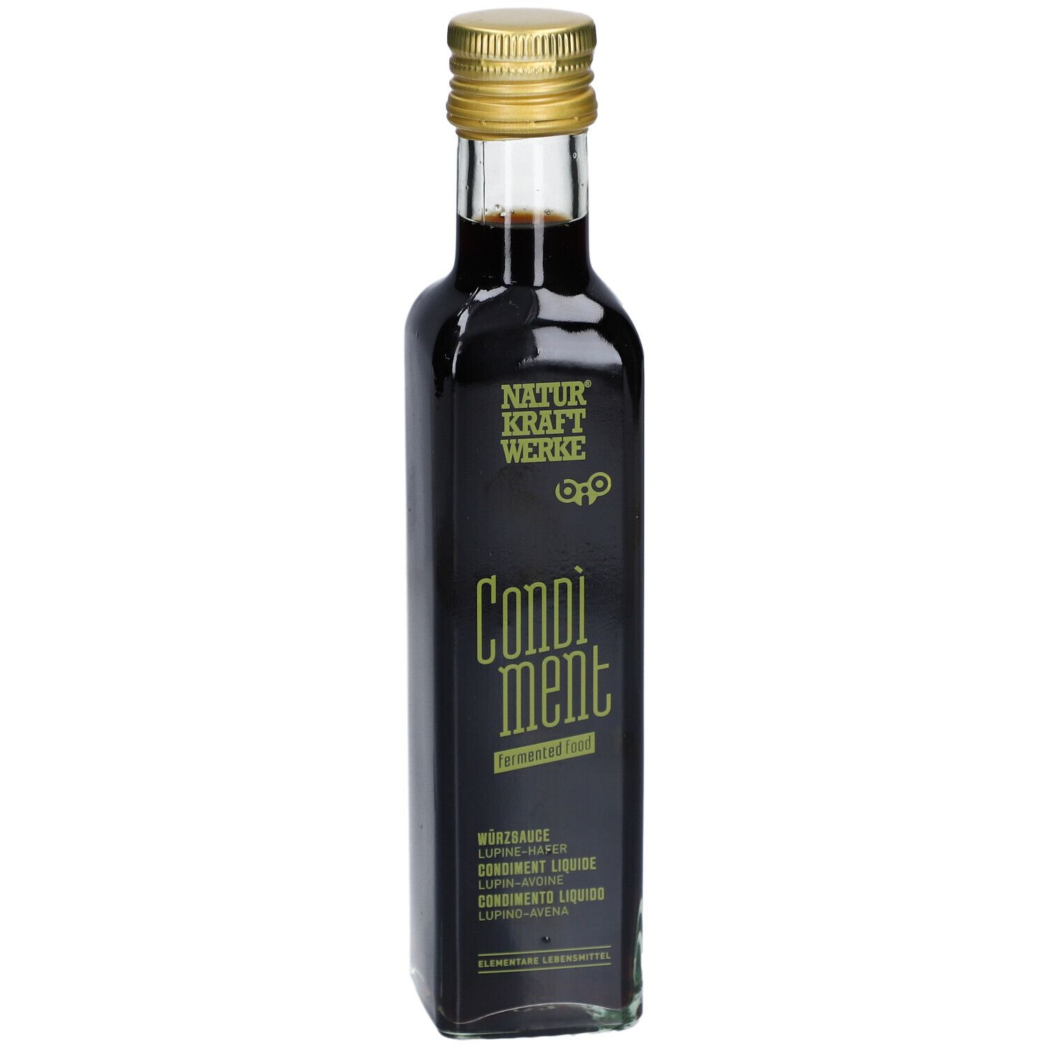 Bouteille en verre foncé avec bouchon doré. Inscription: NATURKRAFTWERKE, Condiment, fermenté. Lupine-Avoine bio.