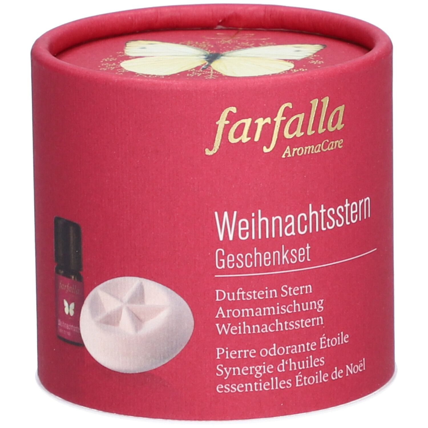 Runde, rote Geschenkbox mit Produktnamen und Inhaltsangaben. Enthält Duftstein, ätherische Öle und einen Stern.