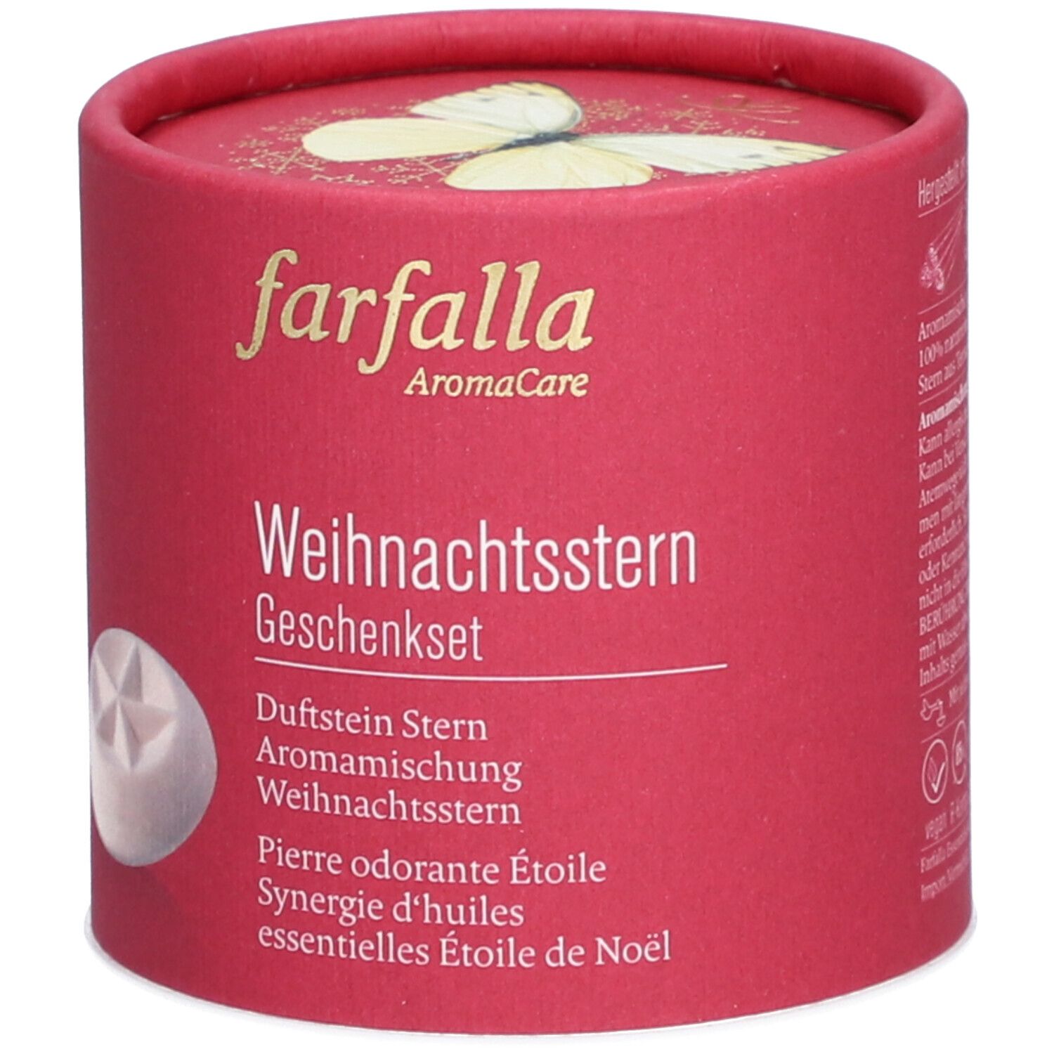 Runde, rote Geschenkbox mit Produktnamen und Inhaltsangaben. Enthält Duftstein, ätherische Öle und einen Stern.
