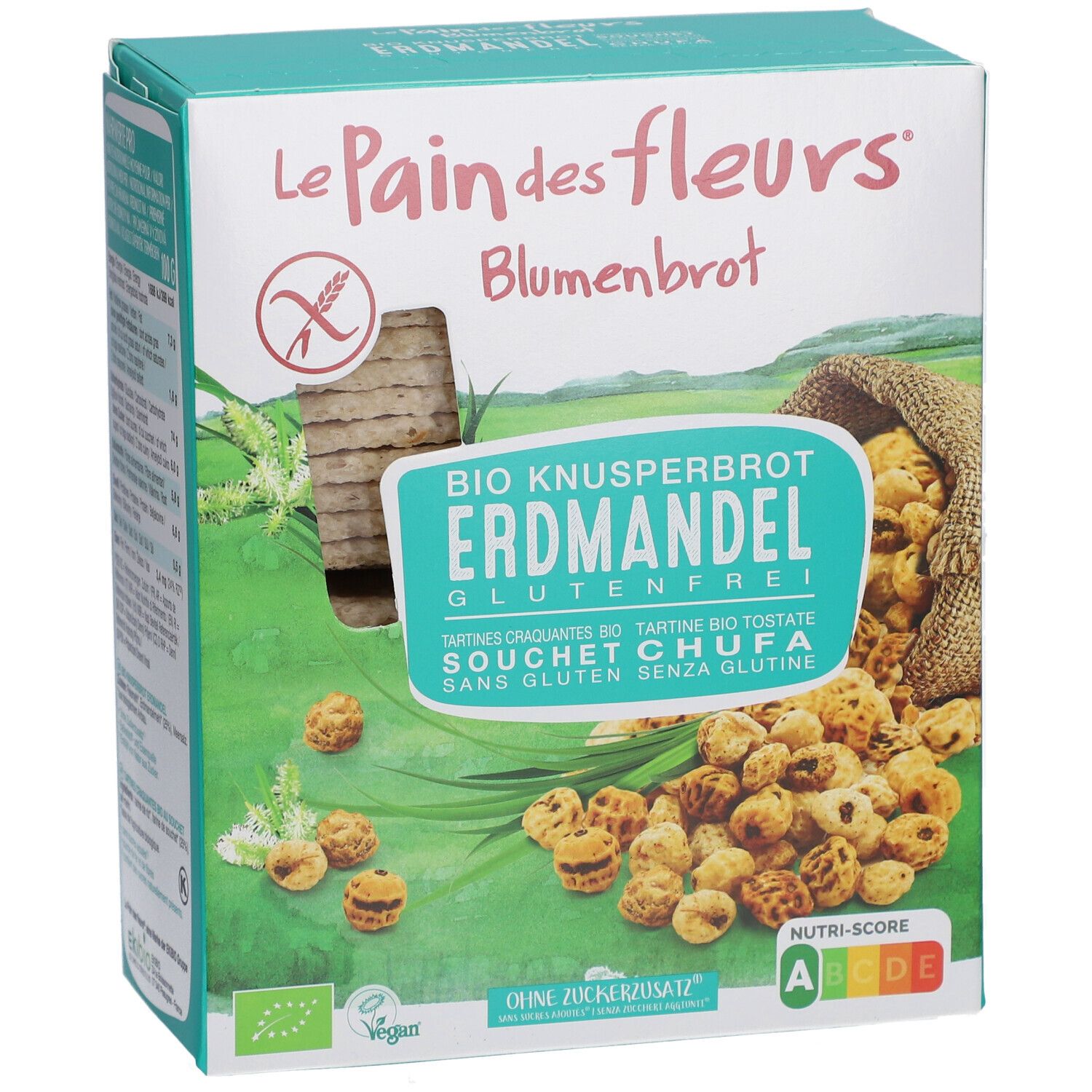 Knäckebrot-Verpackung. Aufschrift: Le Pain des Fleurs, Blumenbrot, Bio Knusperbrot Erdmandel glutenfrei. Mit Tigernüssen und Knäckebrot.