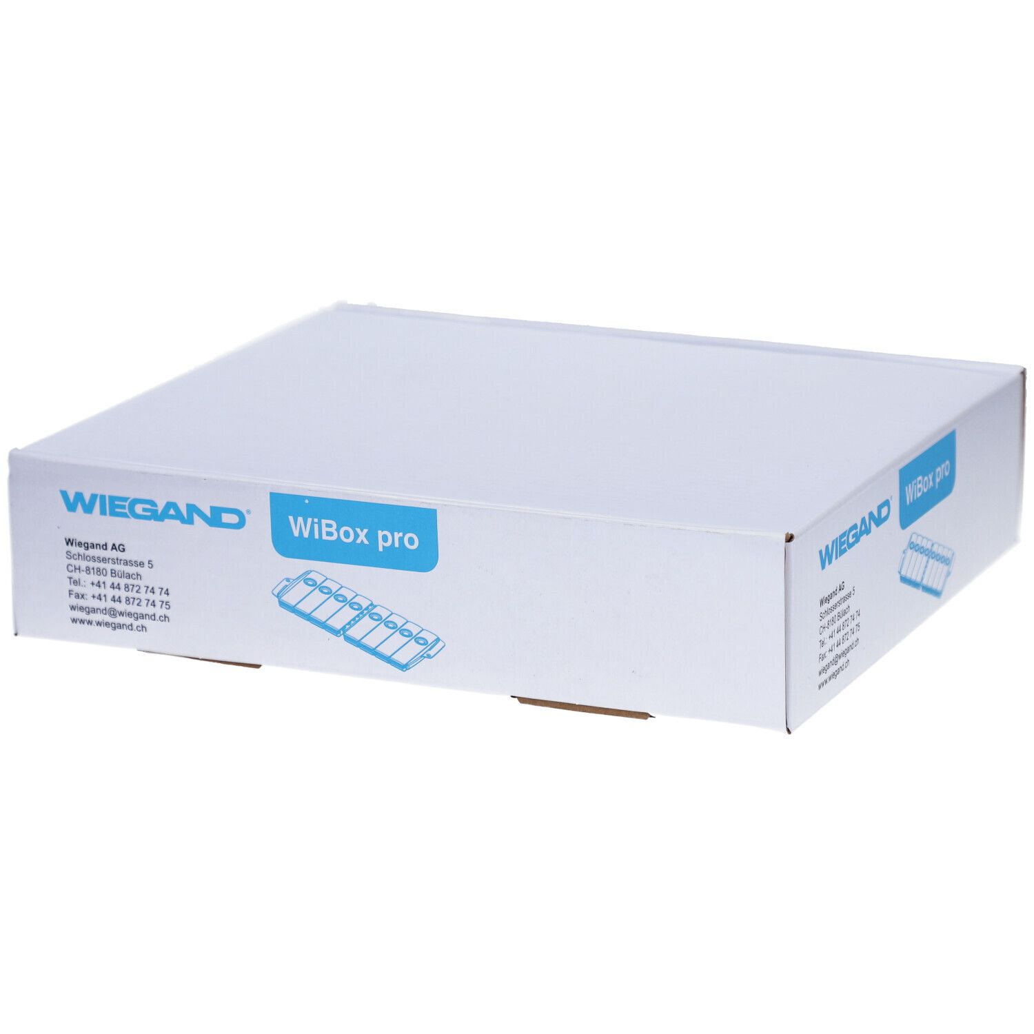 Boîte blanche avec impression WIEGAND, WiBox pro. Vue de dessus de l'emballage.