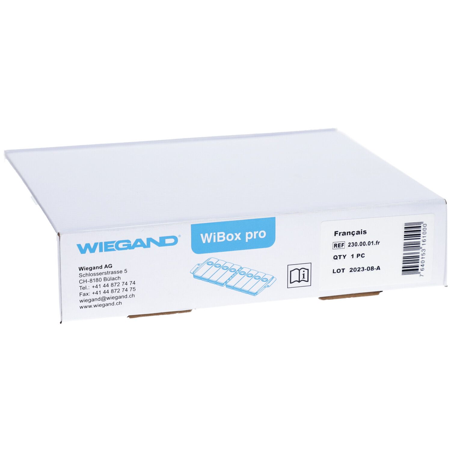 Boîte blanche avec impression WIEGAND, WiBox pro. Étiquette avec informations produit et code-barres.