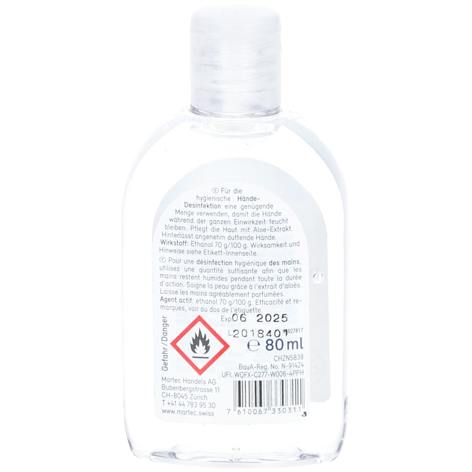 Dos du flacon transparent avec bouchon rabattable. Texte sur l'étiquette. Avertissement: facilement inflammable.