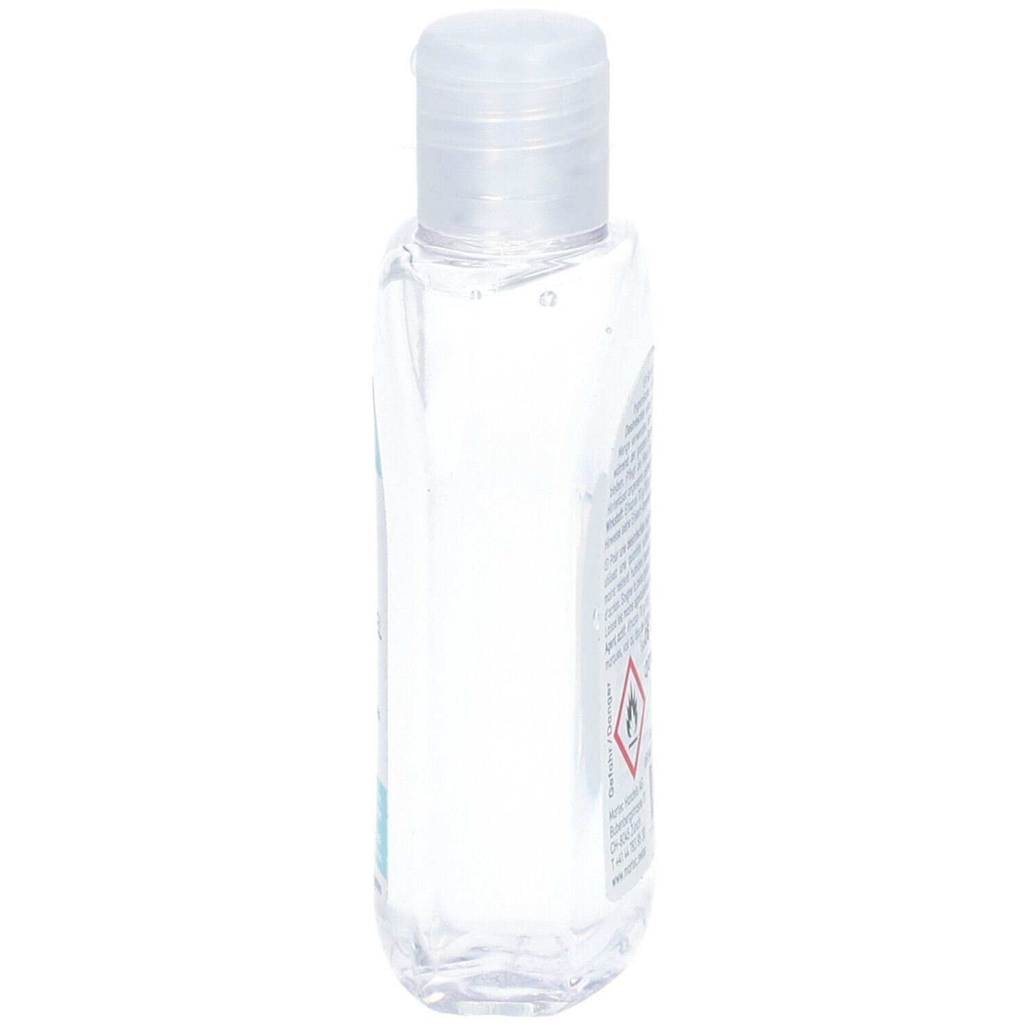 Flacon transparent avec bouchon rabattable. Vue latérale. Étiquette avec texte. Avertissement: facilement inflammable.