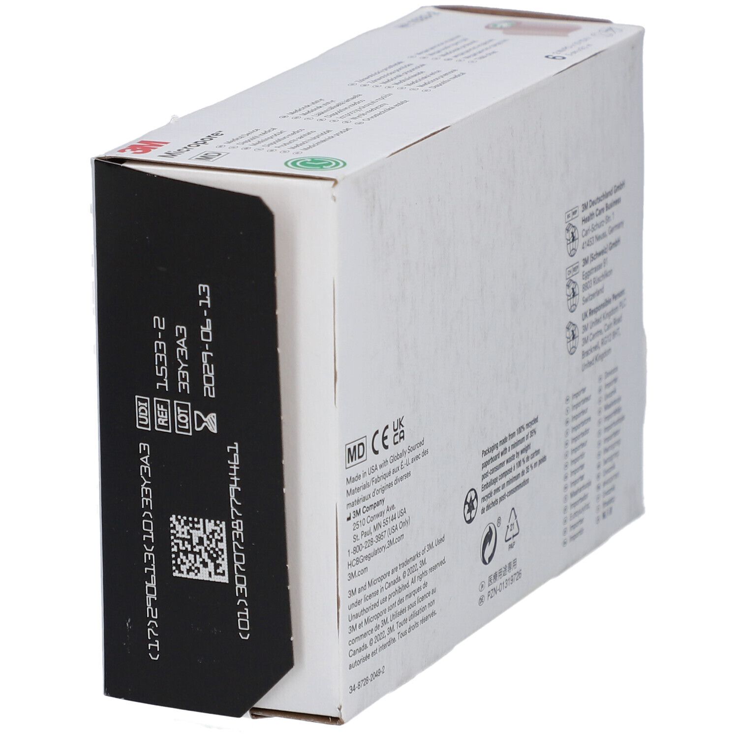 Seitenansicht der Verpackung mit Barcode, MD-Kennzeichnung und Text. Herstellerinformationen und Recycling-Symbole.
