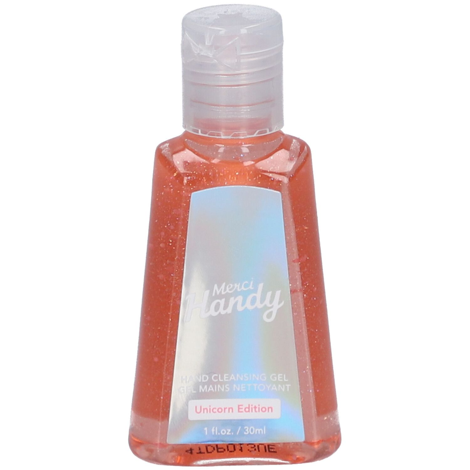 Gel nettoyant pour les mains Merci Handy. Liquide rose dans une petite bouteille avec bouchon rabattable. Autocollant avec texte.