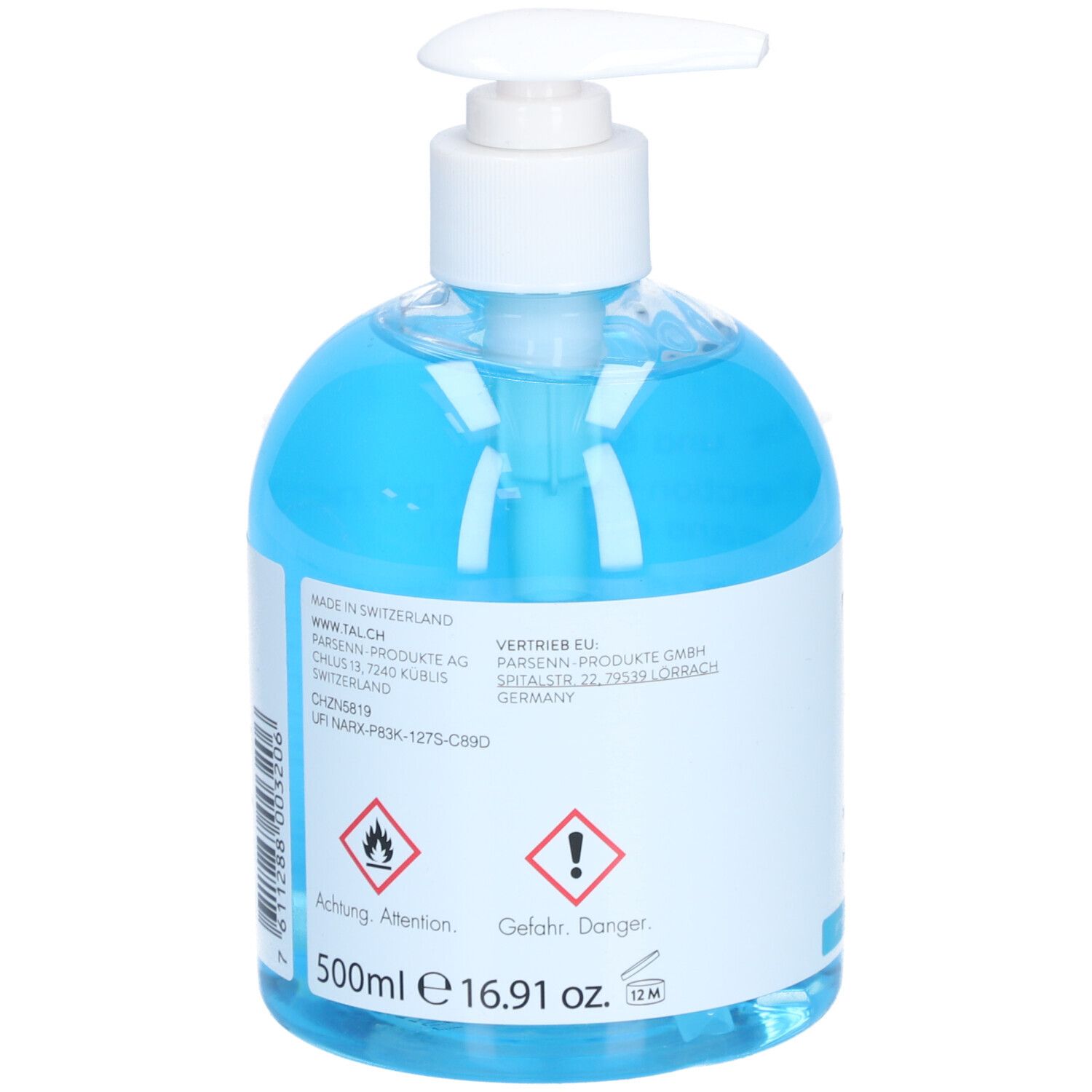 Dos d'un flacon pompe blanc avec liquide bleu. Avertissements et informations sur le fabricant et le contenu.
