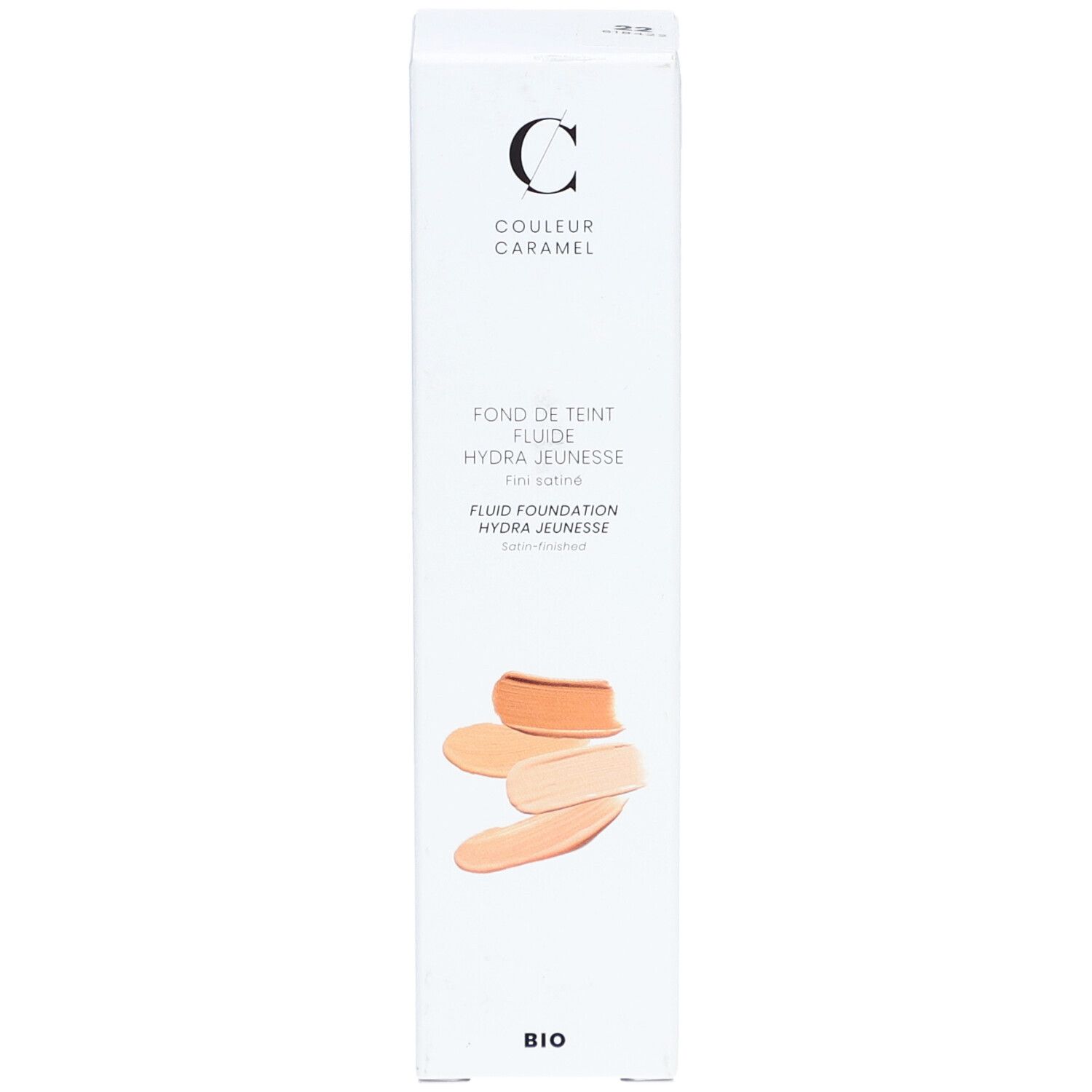 Emballage blanc avec visuel produit. Inscription: COULEUR CARAMEL, Fond de Teint Fluide Hydra Jeunesse. Échantillons de couleurs.