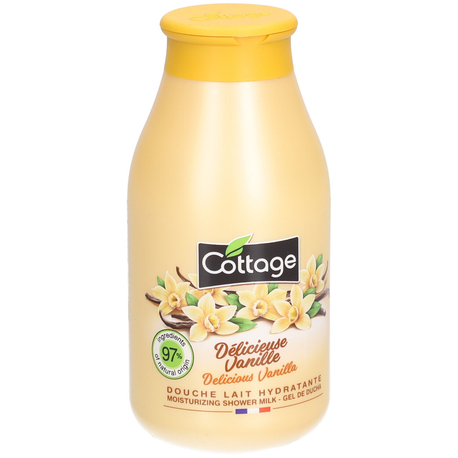 Flacon beige avec bouchon jaune. Inscription: Cottage, Délicieuse Vanille, 97% d'origine naturelle. Illustration: fleurs de vanille.