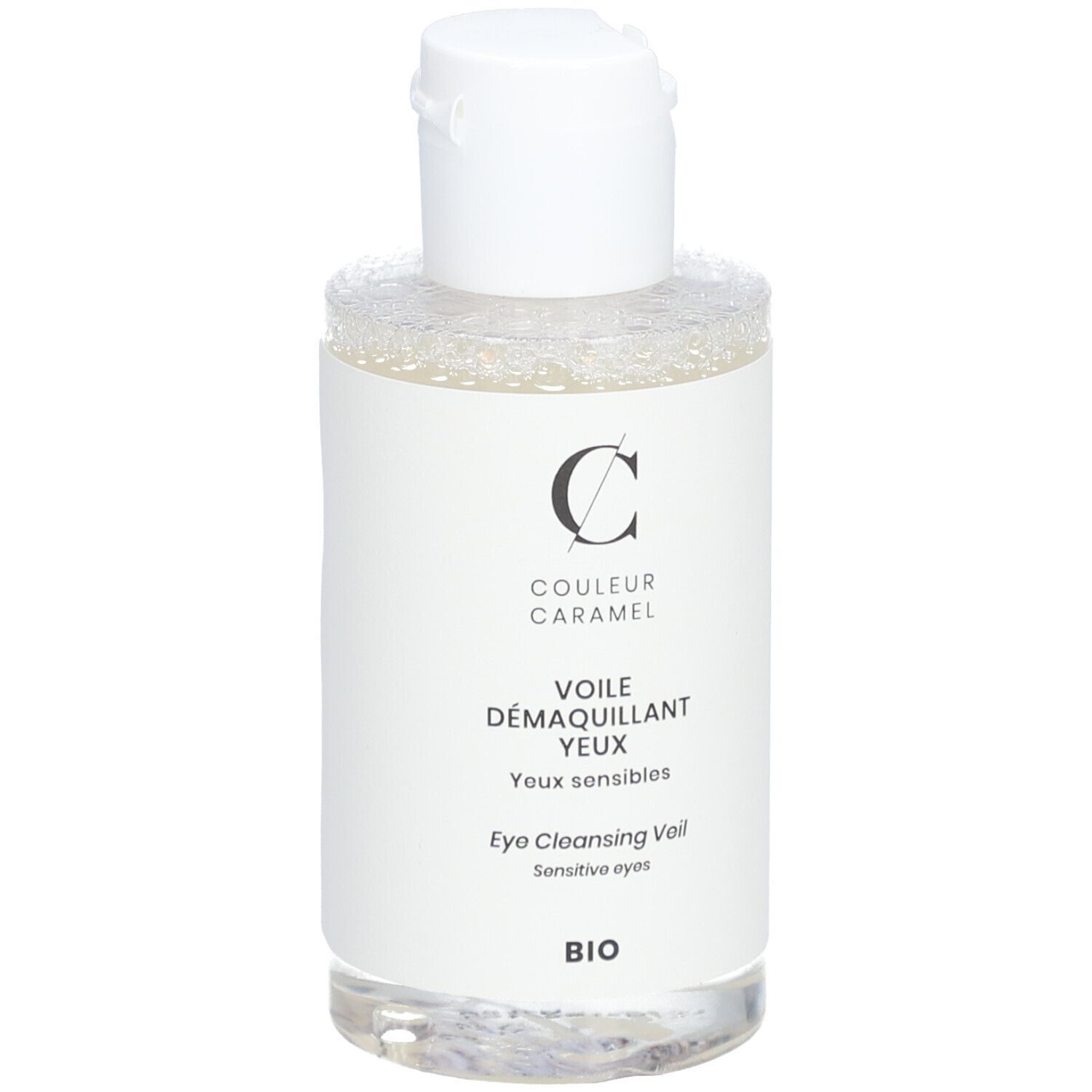 Weiße Flasche mit Produktetikett. Aufschrift: COULEUR CARAMEL, Augen-Make-up-Entferner, empfindliche Augen. BIO-Zertifizierung.