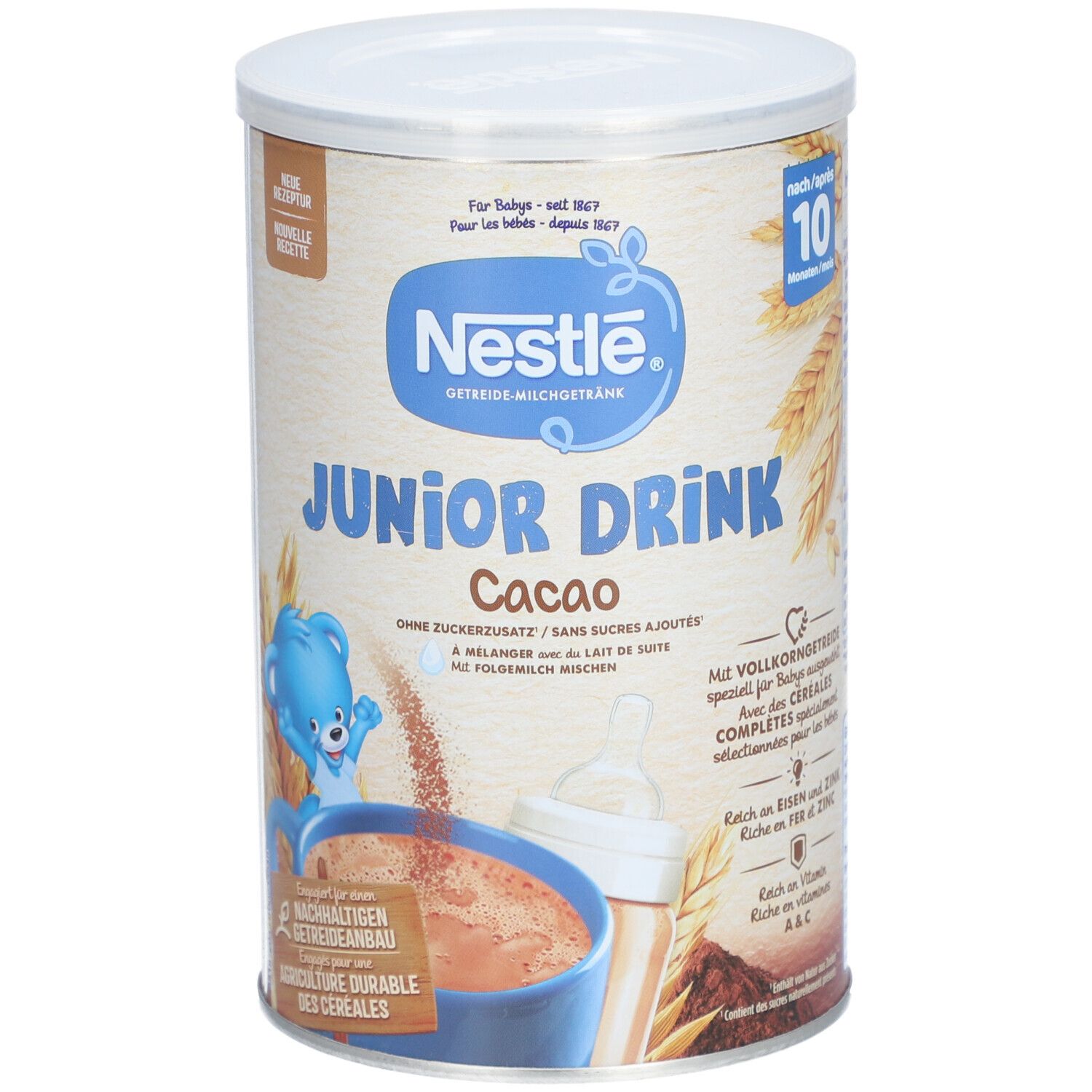 Runde Dose mit Nestlé Junior Drink Cacao. Aufschrift: Ohne Zuckerzusatz. Abbildung: Getränk in Tasse, Flasche, Bär.
