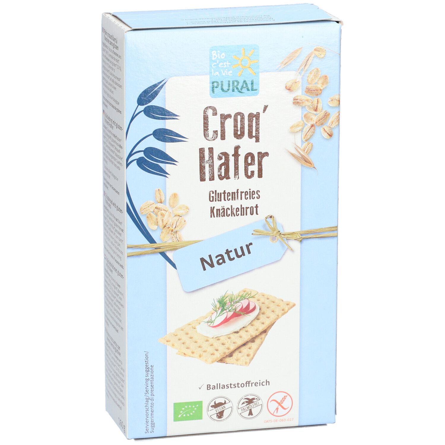Hellblaue Kartonverpackung mit PURAL-Logo und Aufschrift Croq'Hafer Glutenfreies Knäckebrot Natur. Abbildung von Knäckebrot.