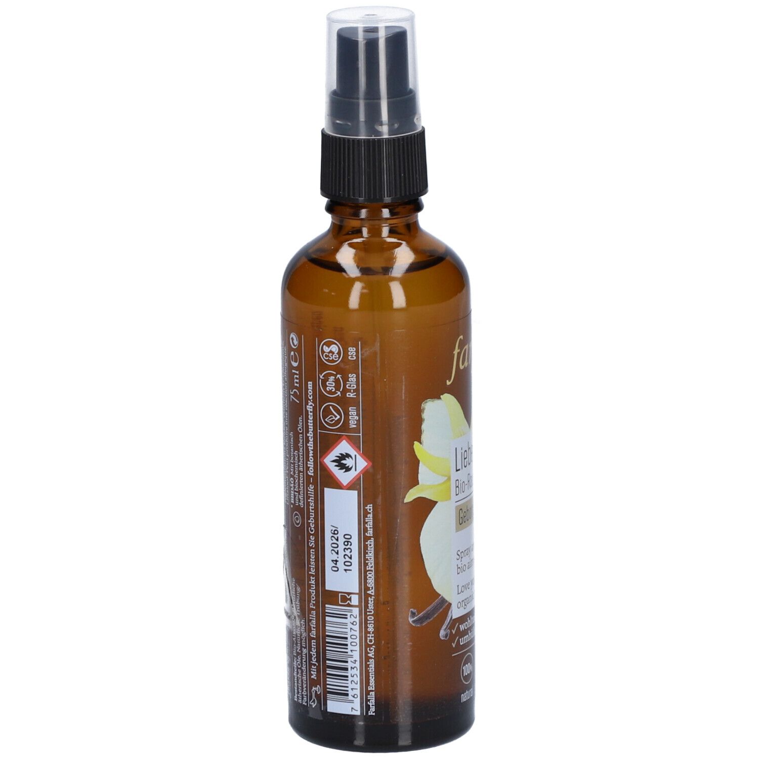 Flacon en verre brun avec vaporisateur. Dos avec texte et avertissements. Inscription: 75 ml.