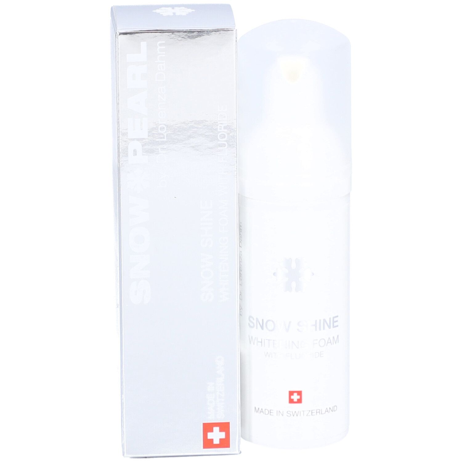 Produktflasche und Schachtel. Aufschrift: Snow Pearl, Snow Shine Whitening Foam mit Fluorid. Schweizer Kreuz.