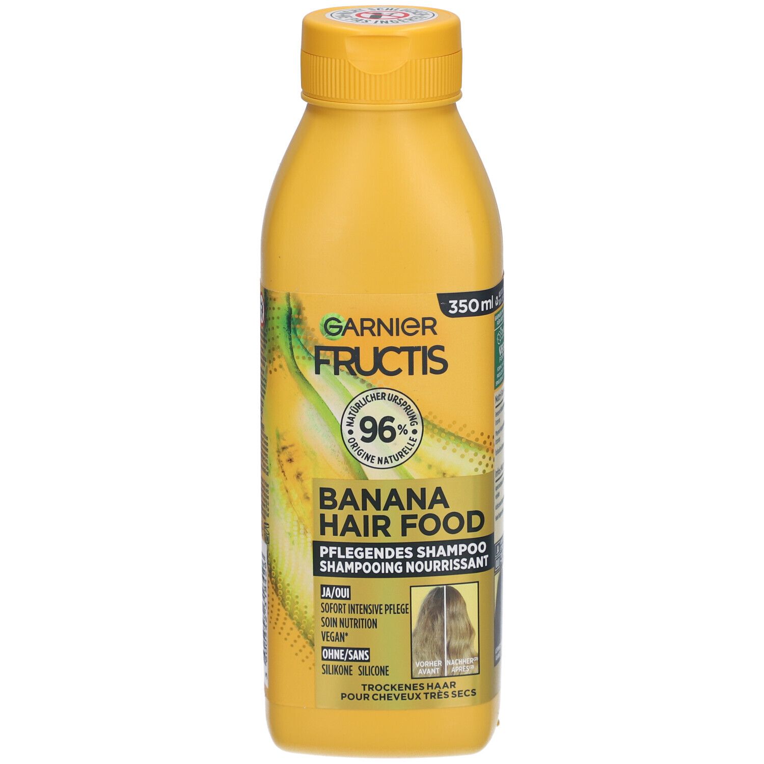 Flacon jaune de shampooing. Inscription: Garnier Fructis Banana Hair Food. 96% ingrédients naturels. 350ml.