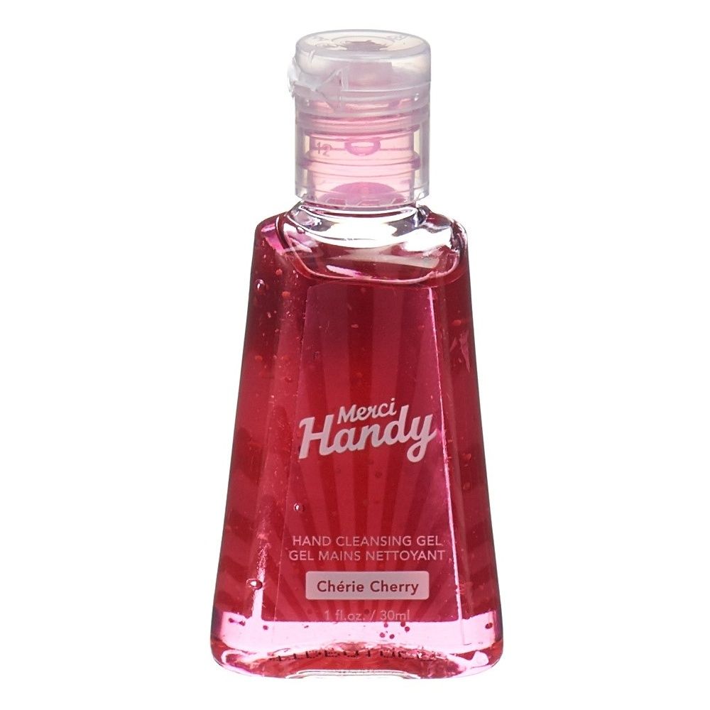 Handreinigungsgel in einer durchsichtigen, roten Flasche. Mit weißem Aufdruck "Merci Handy" und "Chérie Cherry".