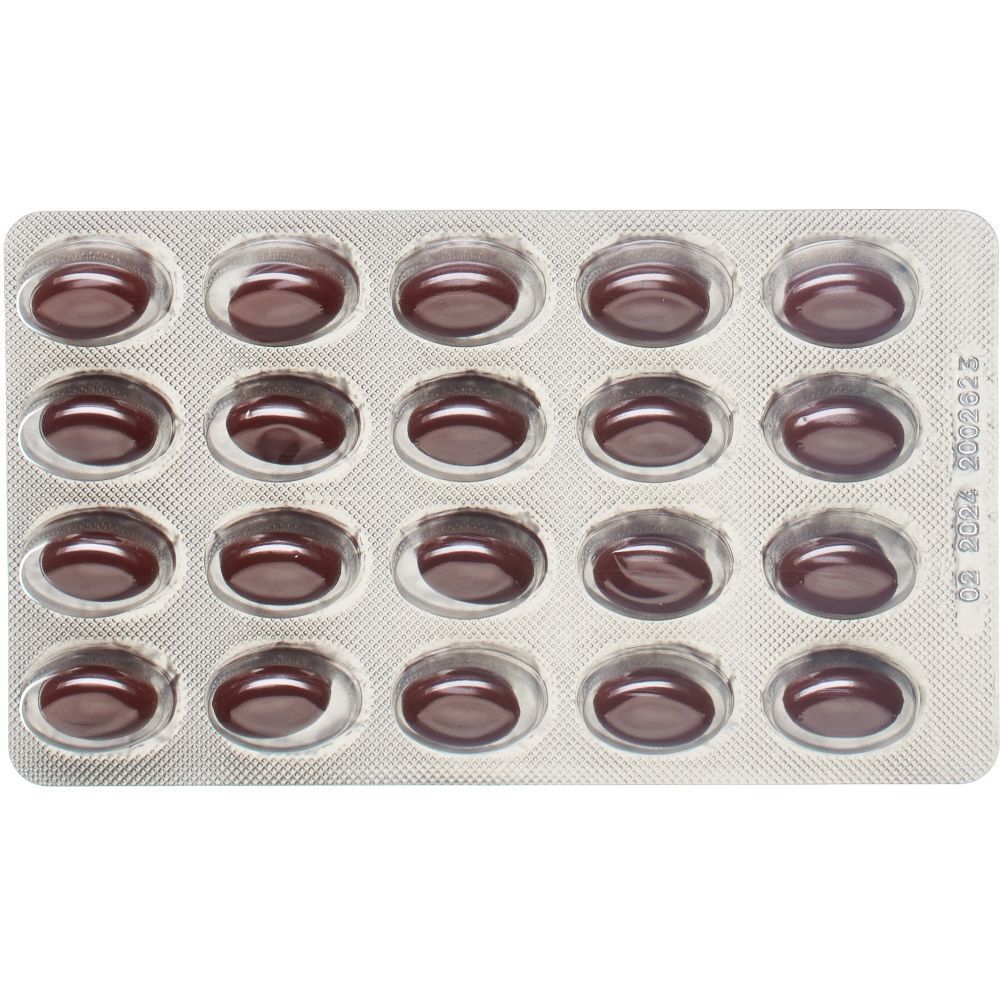 Blisterpackung mit roten Kapseln. Enthält 20 Kapseln. Aufgedruckt sind Zahlen und Buchstaben.