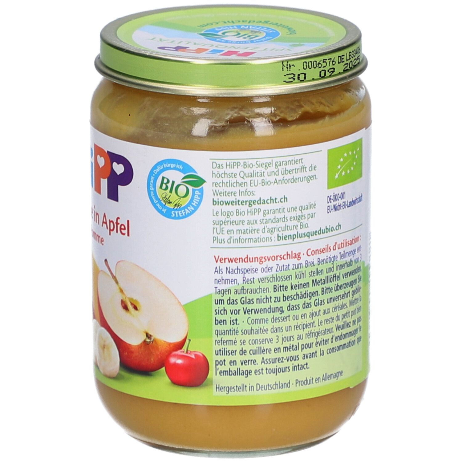 Pot de purée HiPP Bio. Étiquette avec nom du produit, illustrations de fruits et label bio. Couvercle avec date de péremption et label bio.