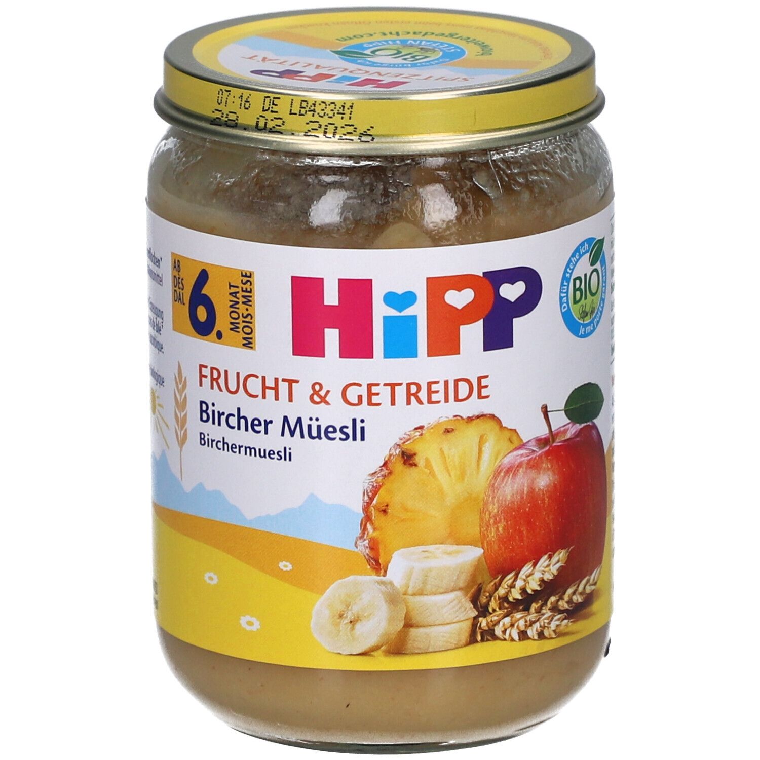 Pot de purée HiPP Bio Bircher Müsli. Inscription : 6 mois, Fruits & Céréales, Bircher Müsli. Illustration de fruits.