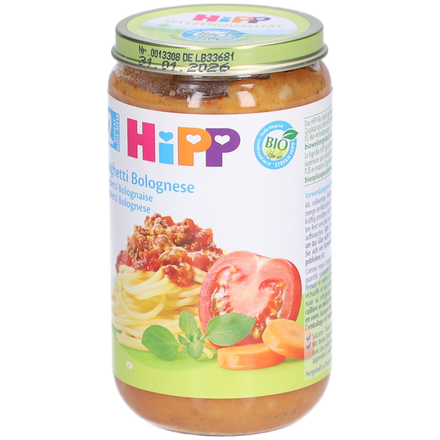 Glas mit HIPP Spaghetti Bolognese für Babys ab 12 Monaten. Aufdruck mit Tomaten, Karotten und Nudeln.