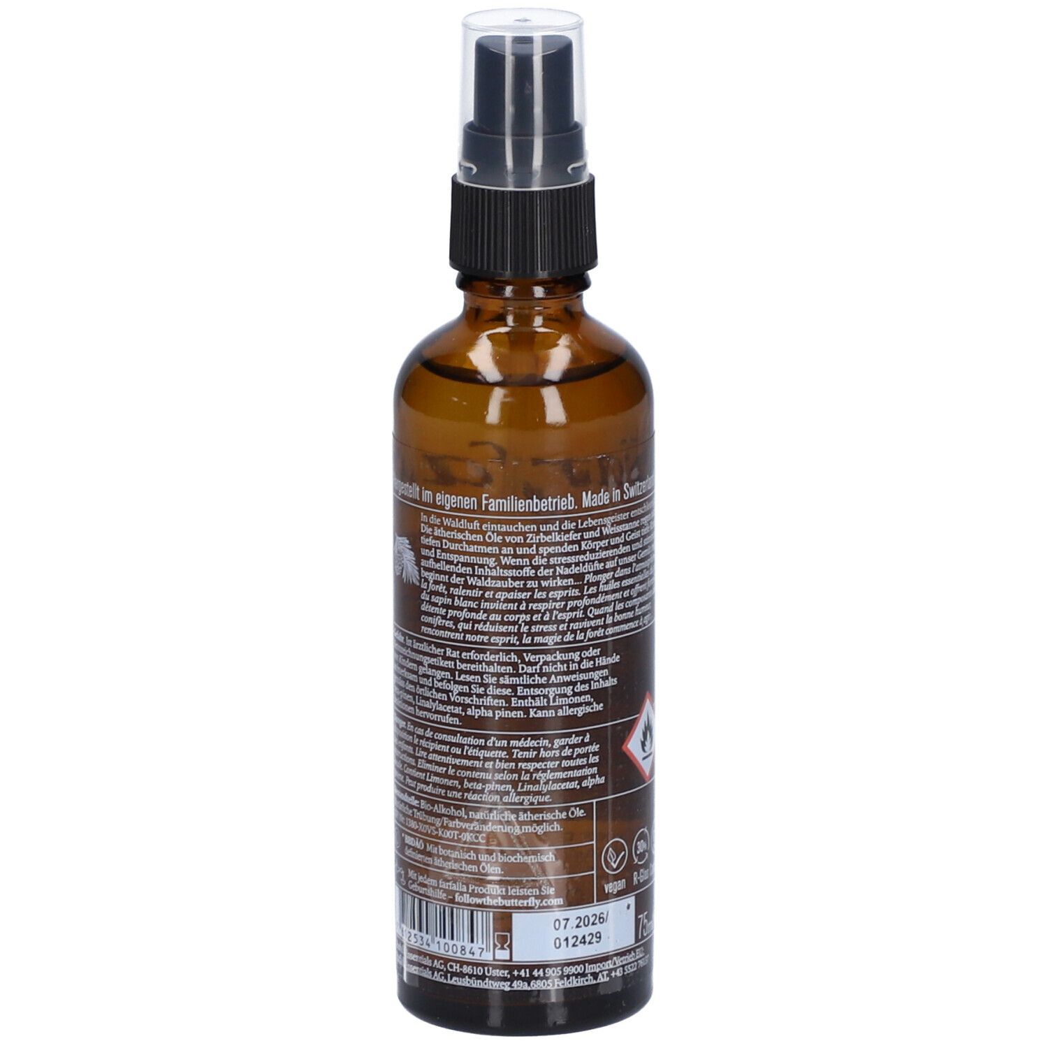 Braune Glasflasche mit Sprühkopf. Rückseite mit Text. Warnhinweis: Entzündlich. Mindesthaltbarkeitsdatum: 07.2026.