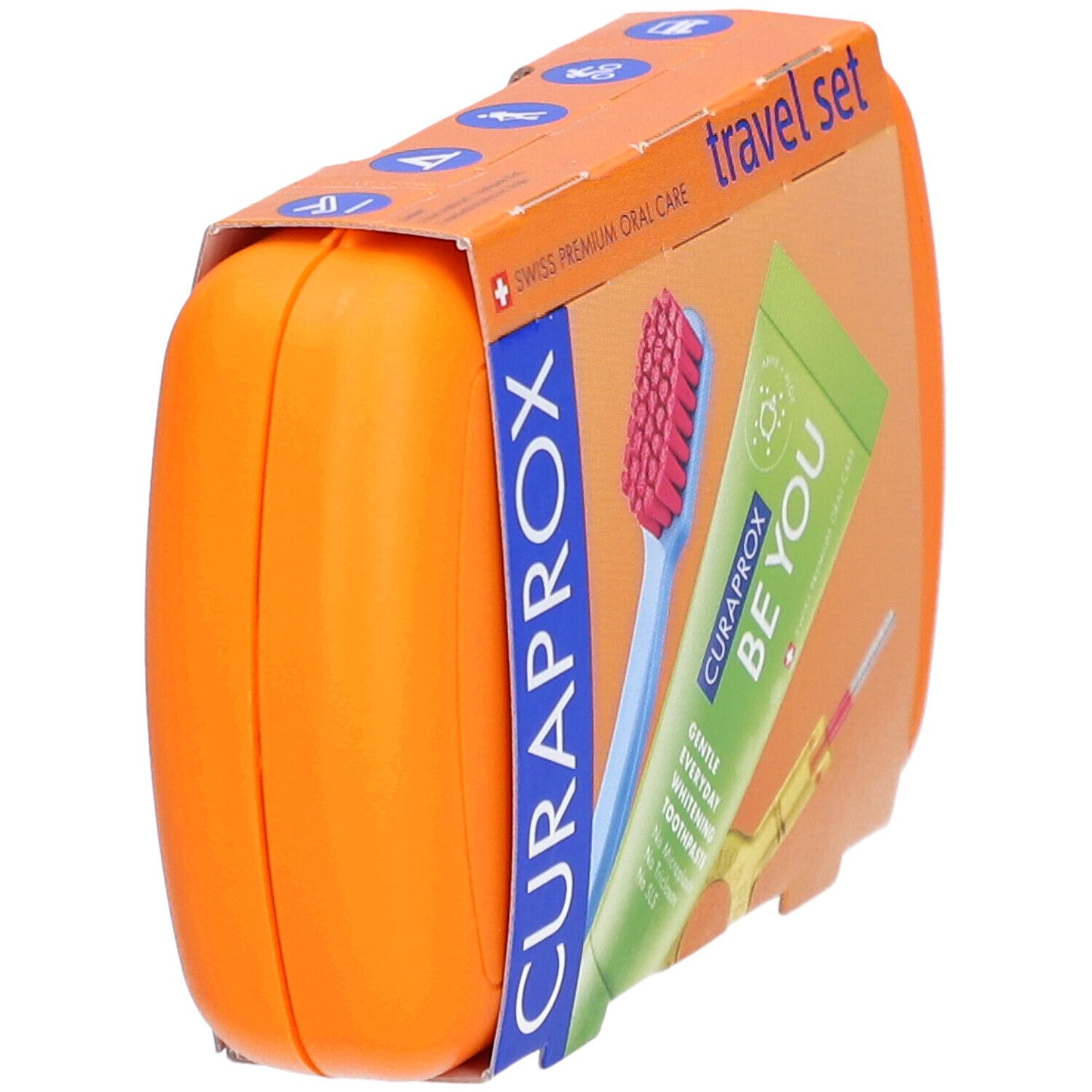 Orangefarbenes CURAPROX Travel Set. Enthält Zahnbürste, Zahnpasta und Interdentalbürste. Verpackung teilweise sichtbar.