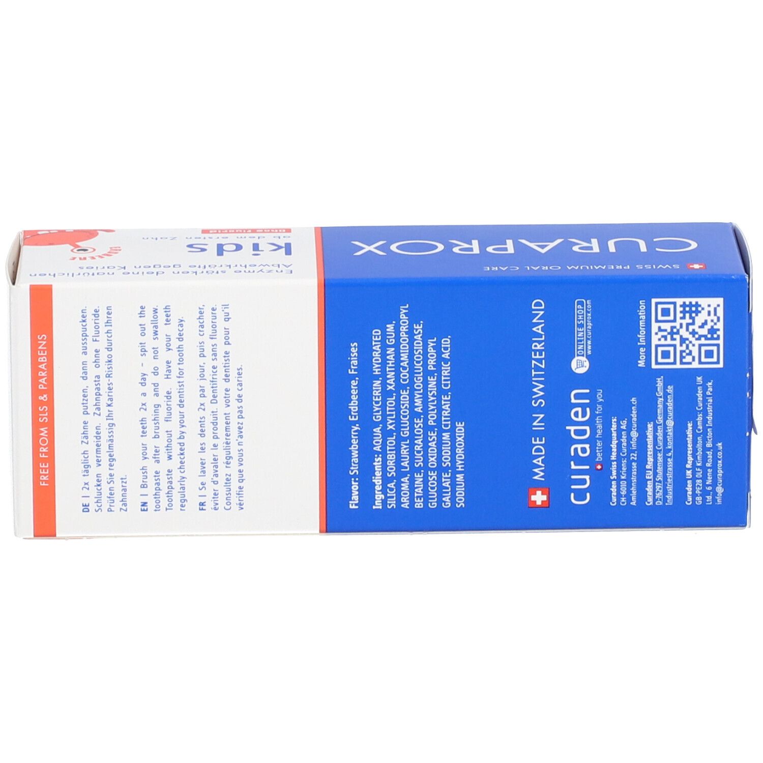 Zahncreme-Schachtel, blau-weiß. Aufgedruckt: Inhaltsstoffe, Anwendungshinweise in mehreren Sprachen.