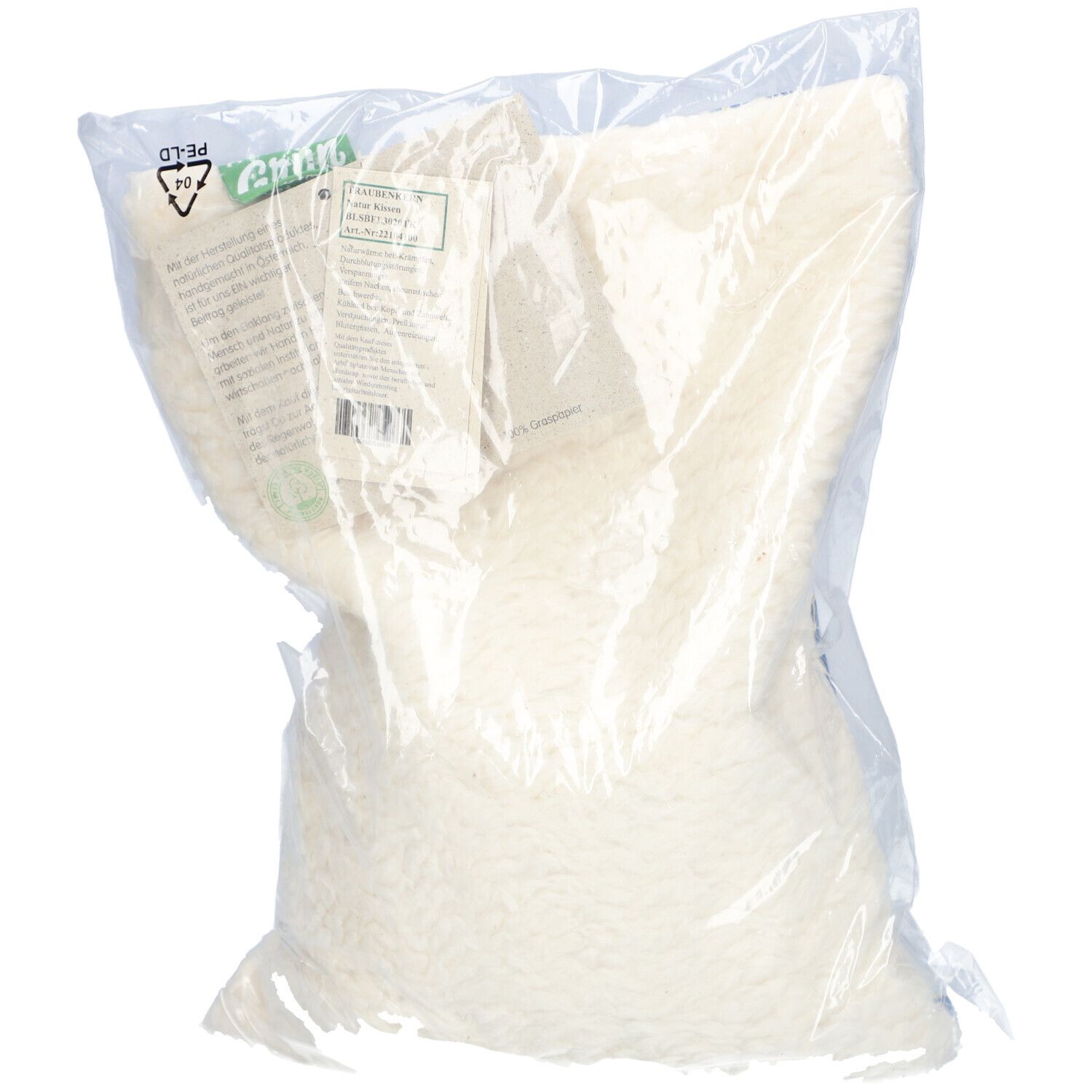 Weißes Kissen in transparenter Verpackung. Etikett mit Produktinformationen und Barcode sichtbar.