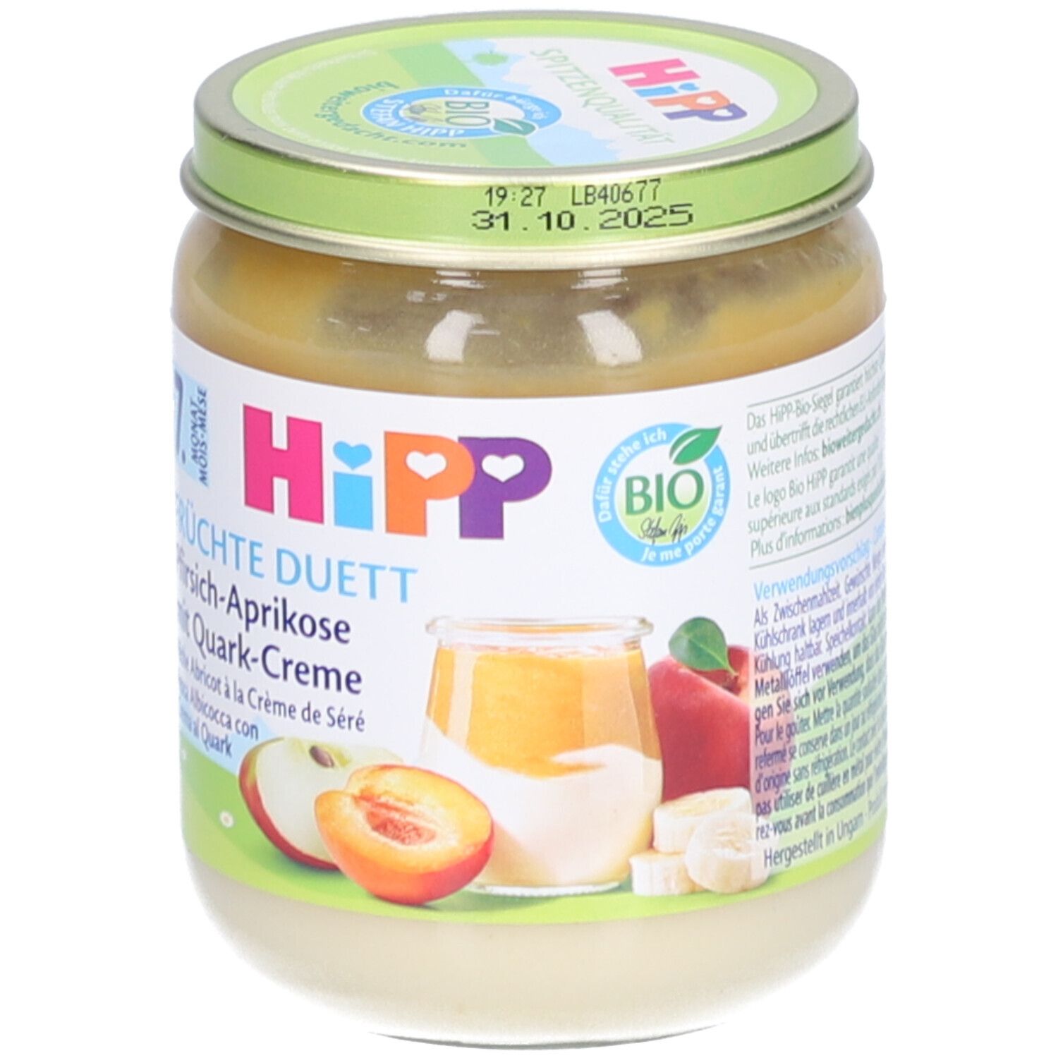 Glas mit Fruchtpüree. Aufschrift: HIPP, Früchte Duett Pfirsich-Aprikose mit Quark-Creme. Bio-Siegel. Deckel mit Haltbarkeitsdatum.