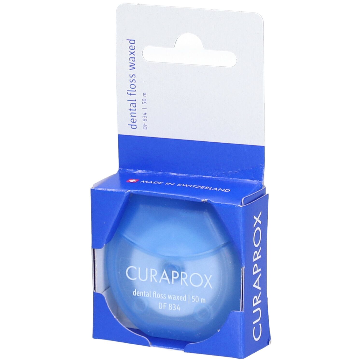 Fil dentaire ciré, 50 m, dans un emballage bleu. Marque CURAPROX.