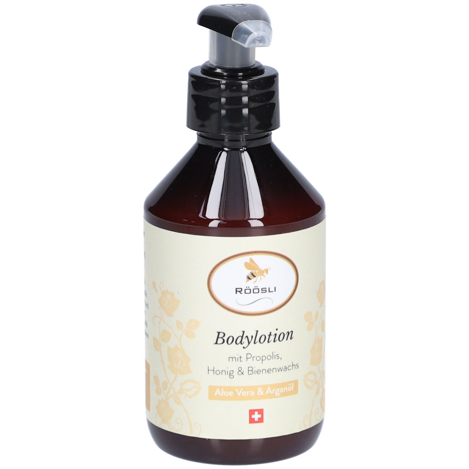 Braune Flasche mit schwarzem Pumpverschluss. Etikett mit Text: Bodylotion, Aloe Vera & Arganöl, Schweizer Kreuz.