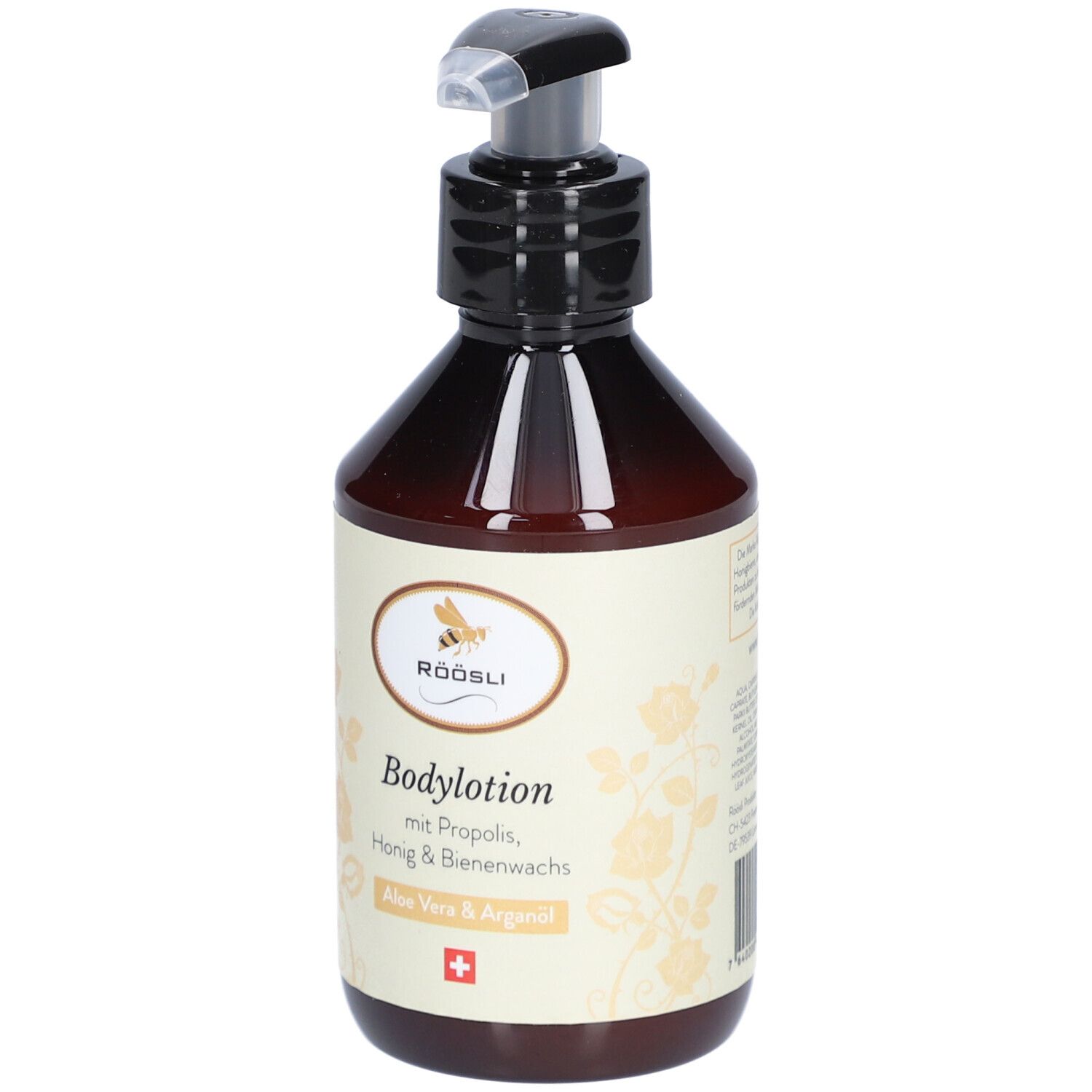 Braune Flasche mit schwarzem Pumpverschluss. Etikett mit Text: Bodylotion, Aloe Vera & Arganöl, Schweizer Kreuz.