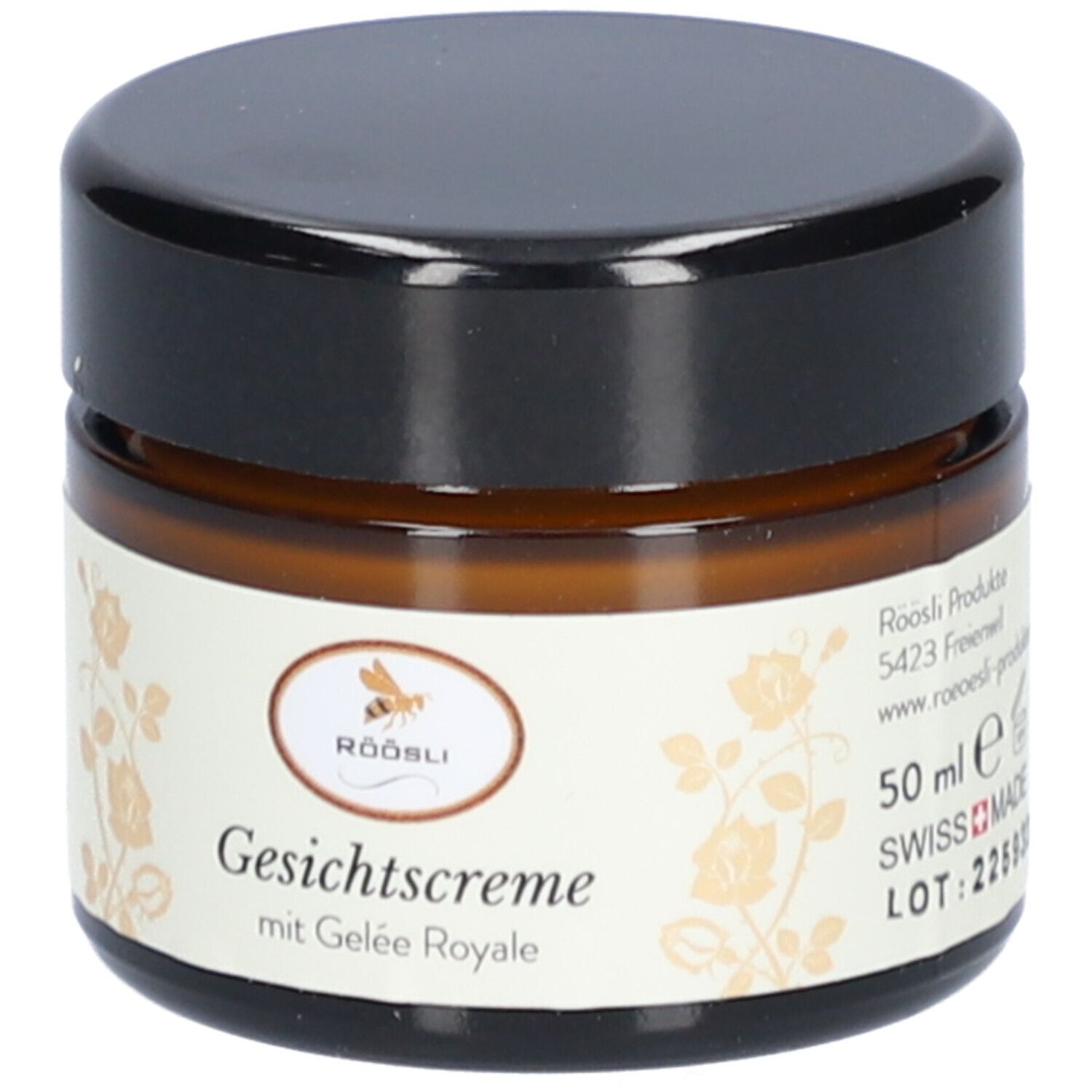 Braune Glasdose mit schwarzem Deckel. Etikett: Röösli, Gesichtscrème mit Gelée Royale, 50 ml, Swiss Made.