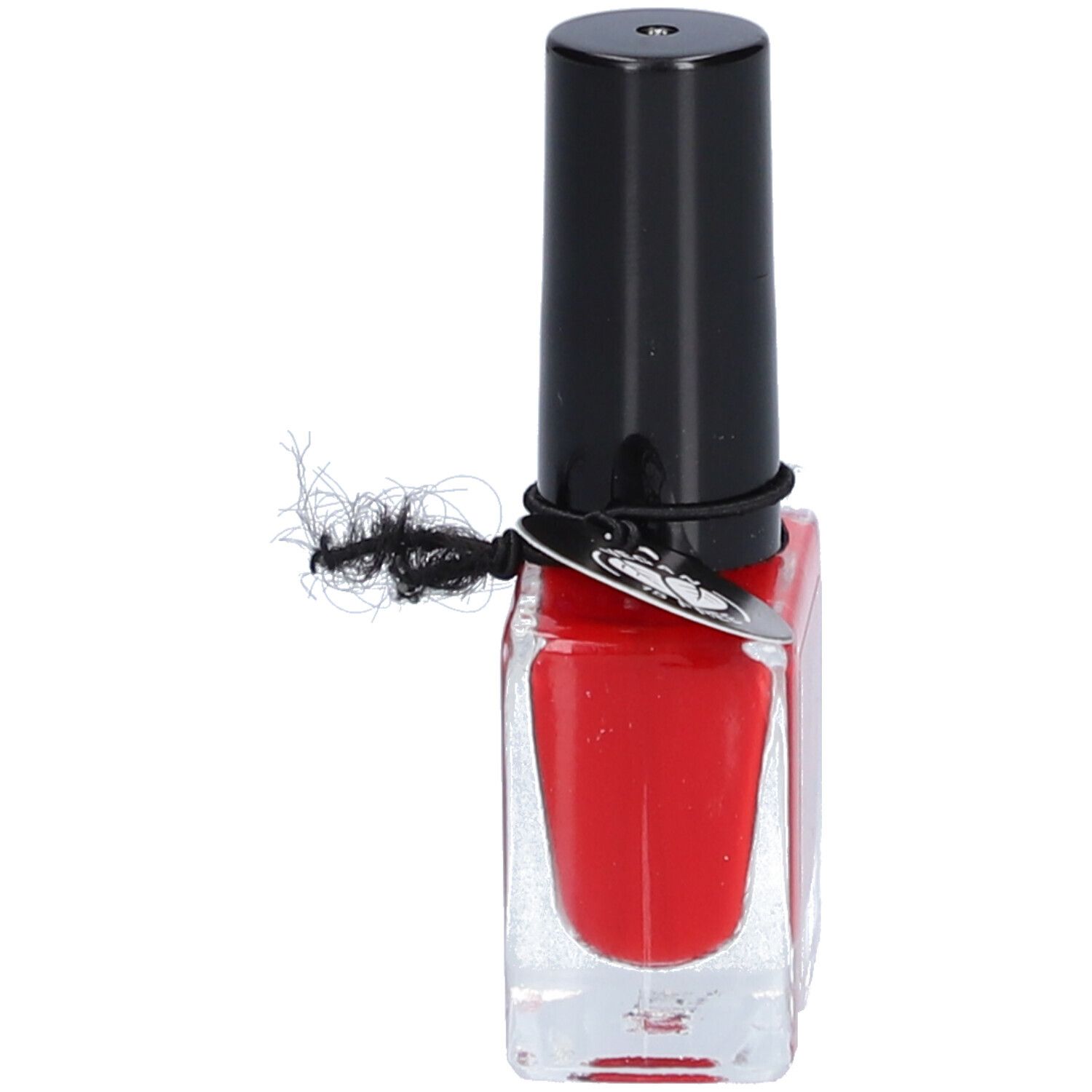 Flacon de vernis à ongles rouge avec bouchon noir. Bande élastique noire. Inscription illisible.